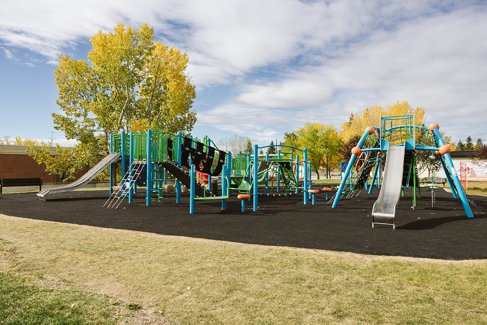 Dalhousie School (Calgary, AB) playground in Calgary, AB - overview of play area and equipment