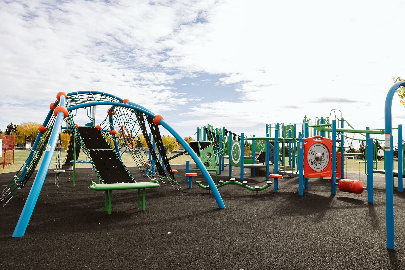 Dalhousie School (Calgary, AB) playground in Calgary, AB - playground swings and slides
