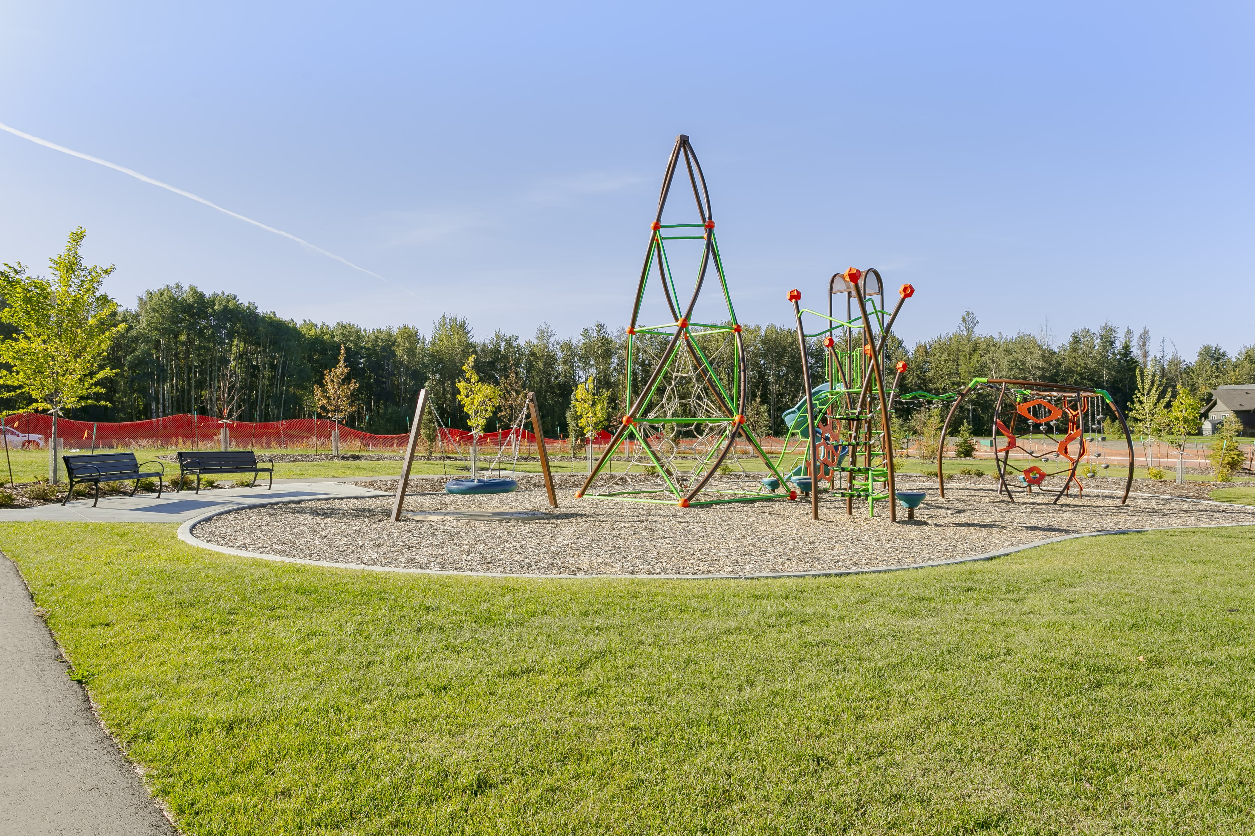 Fenwyck Community Playground (Spruce Grove, AB) playground in Spruce Grove, AB - children playing on equipment