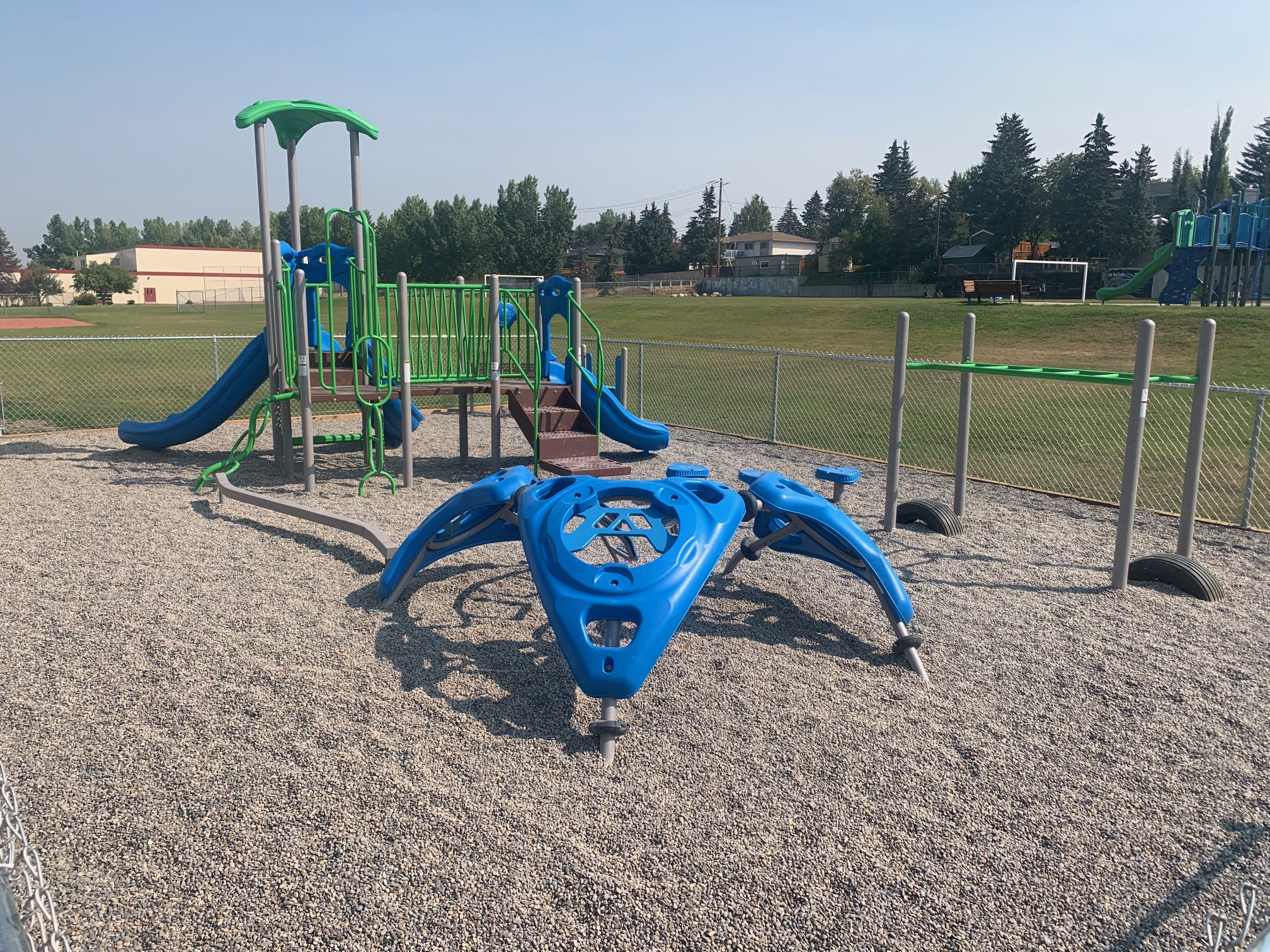 Calgary Christian Preschool (Calgary, AB) playground in Calgary, AB - overview of play area and equipment