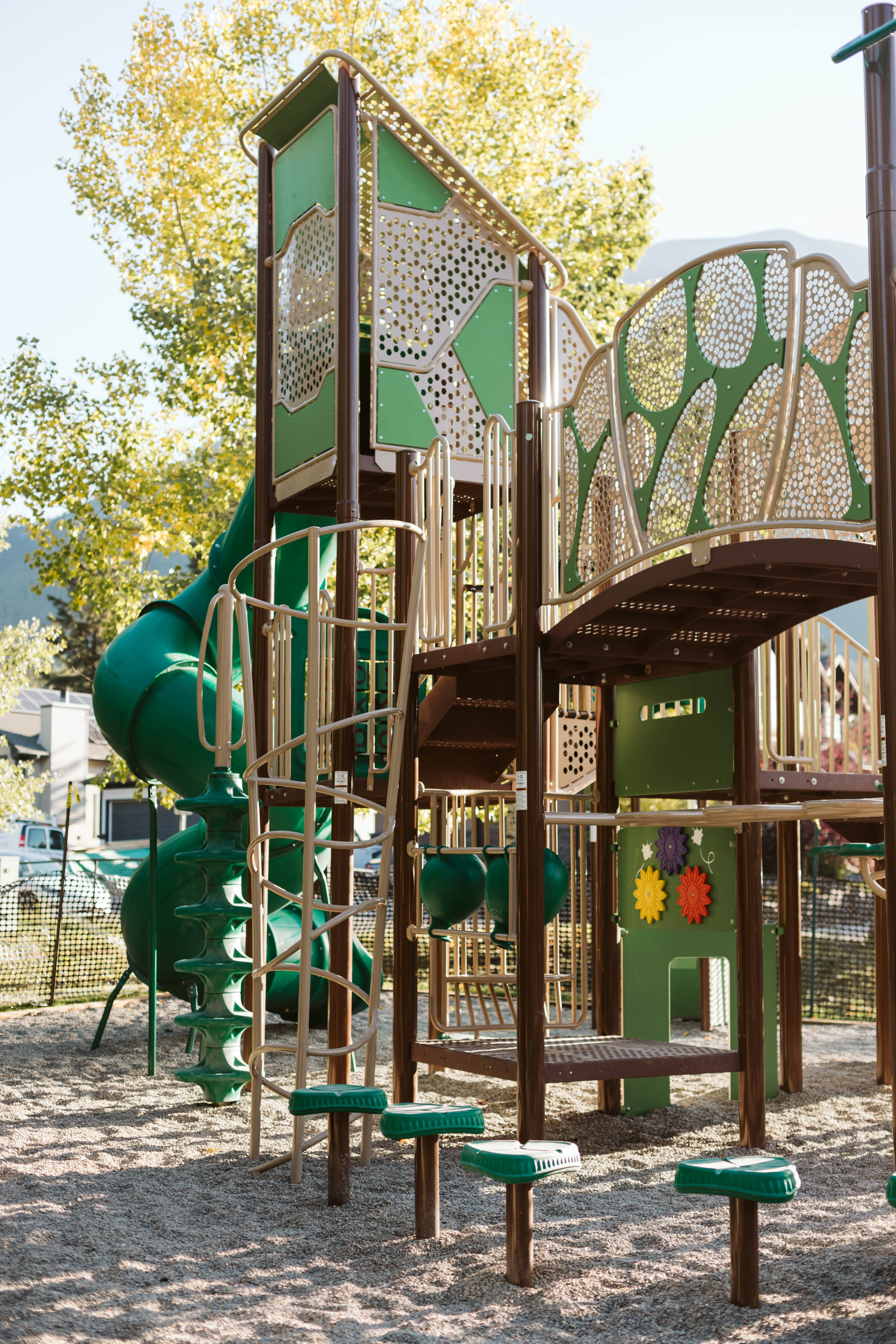 Lady MacDonald Park (Canmore, AB) playground in Canmore, AB - play area surfacing and safety features