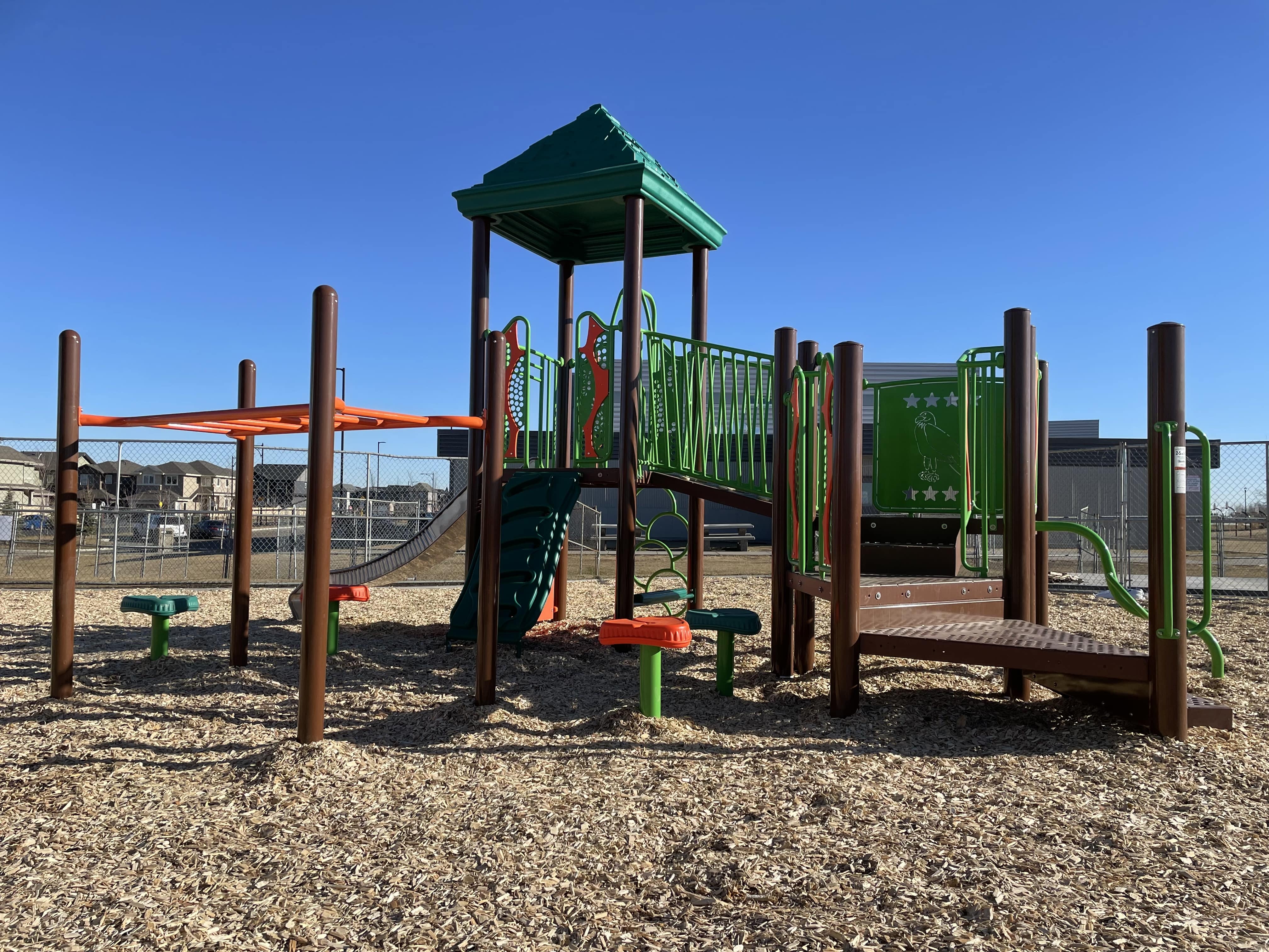 Shauna May Seneca School playground in Edmonton, AB - accessible play equipment