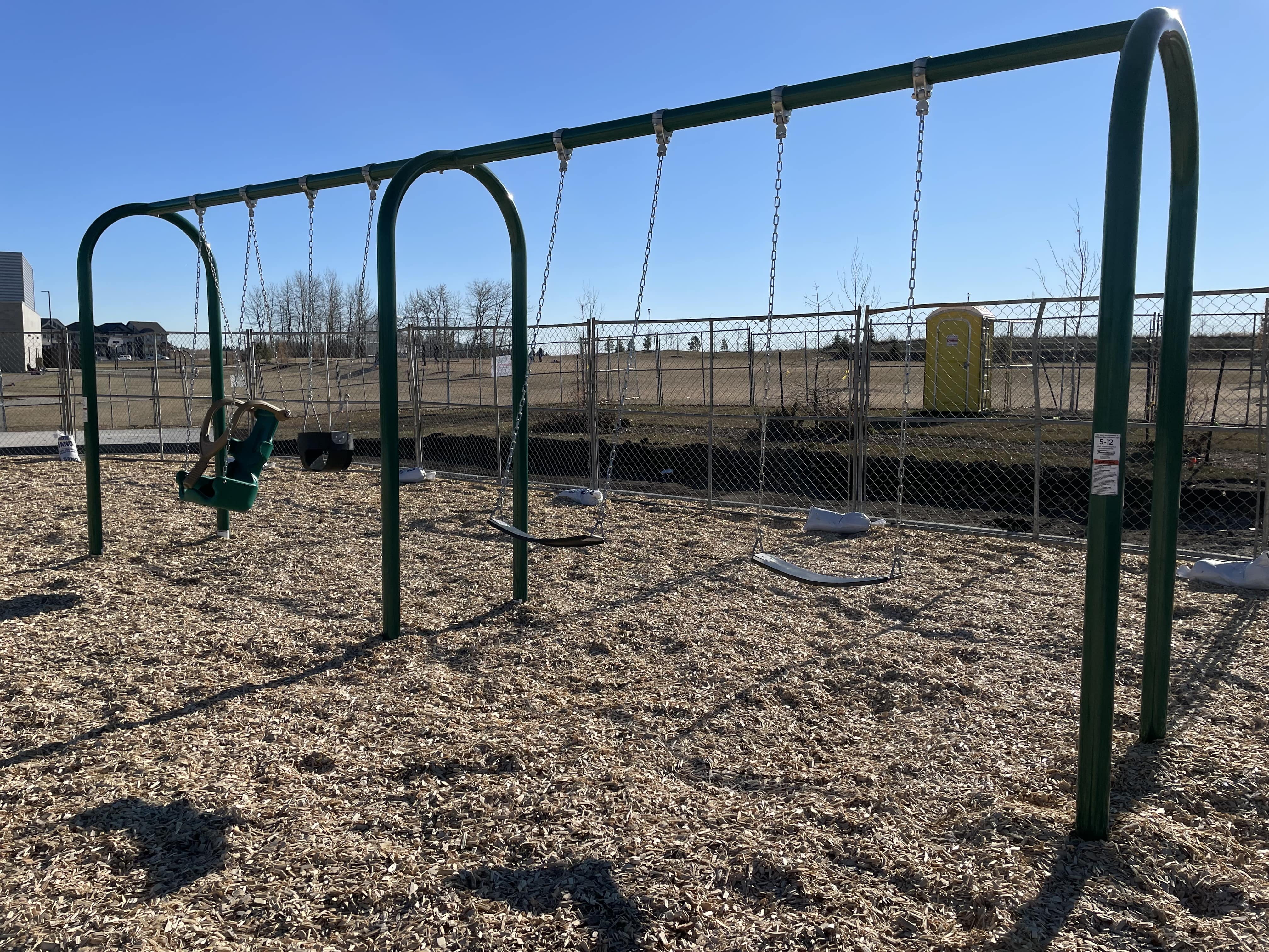 Shauna May Seneca School playground in Edmonton, AB - playground safety surfacing