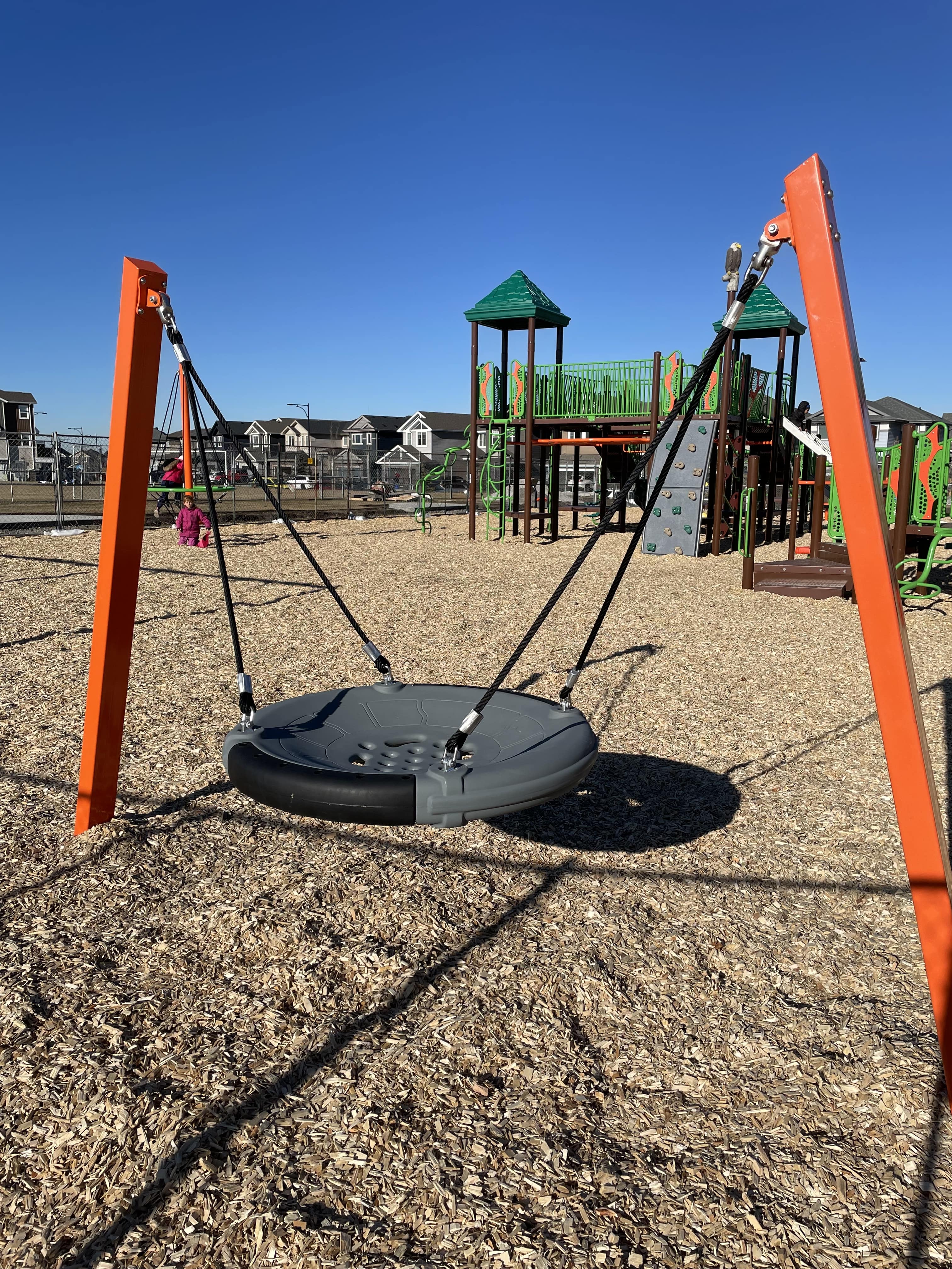 Shauna May Seneca School playground in Edmonton, AB - playground swing sets and slides
