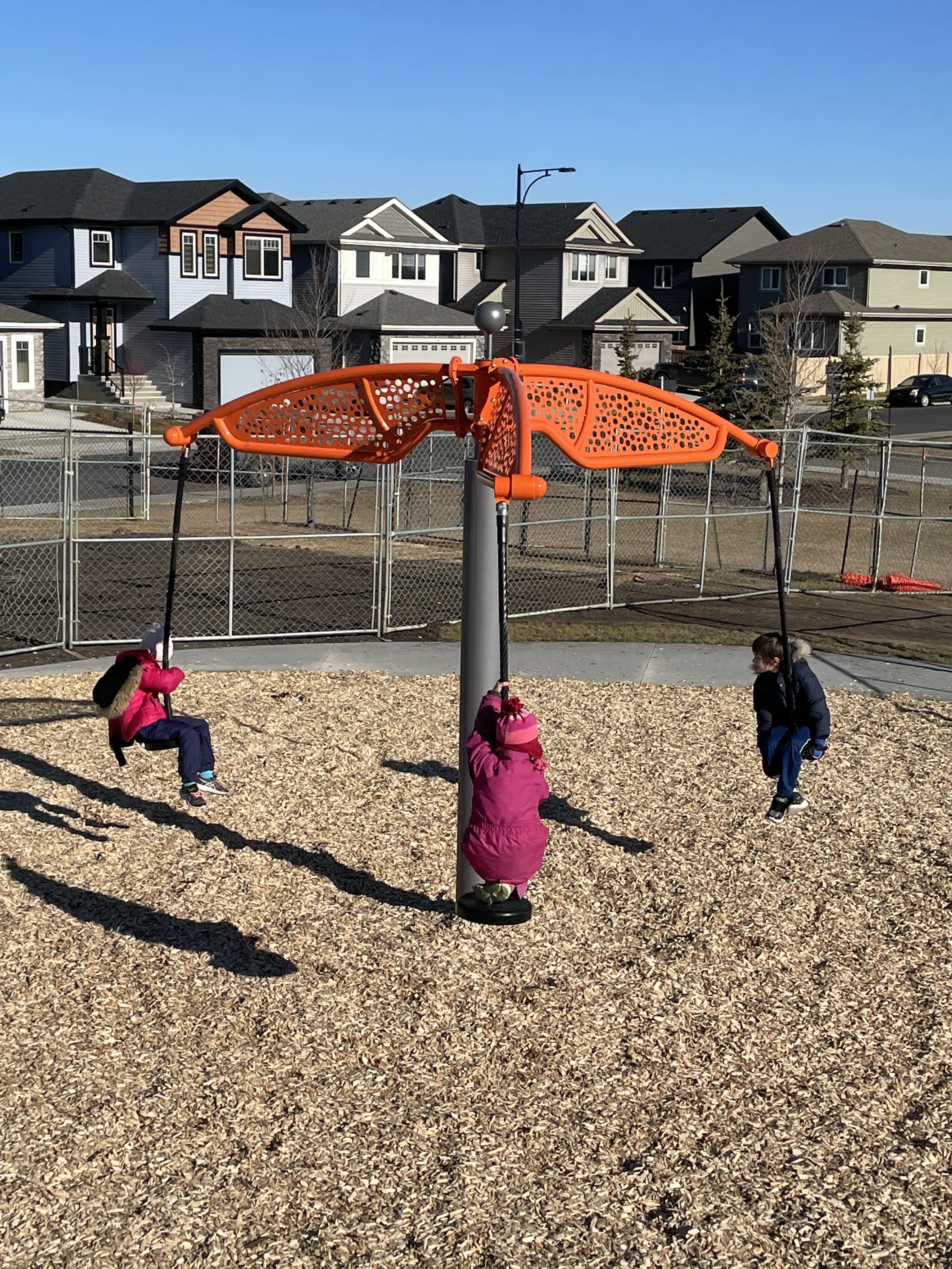 Shauna May Seneca School playground in Edmonton, AB - play area surfacing and safety features
