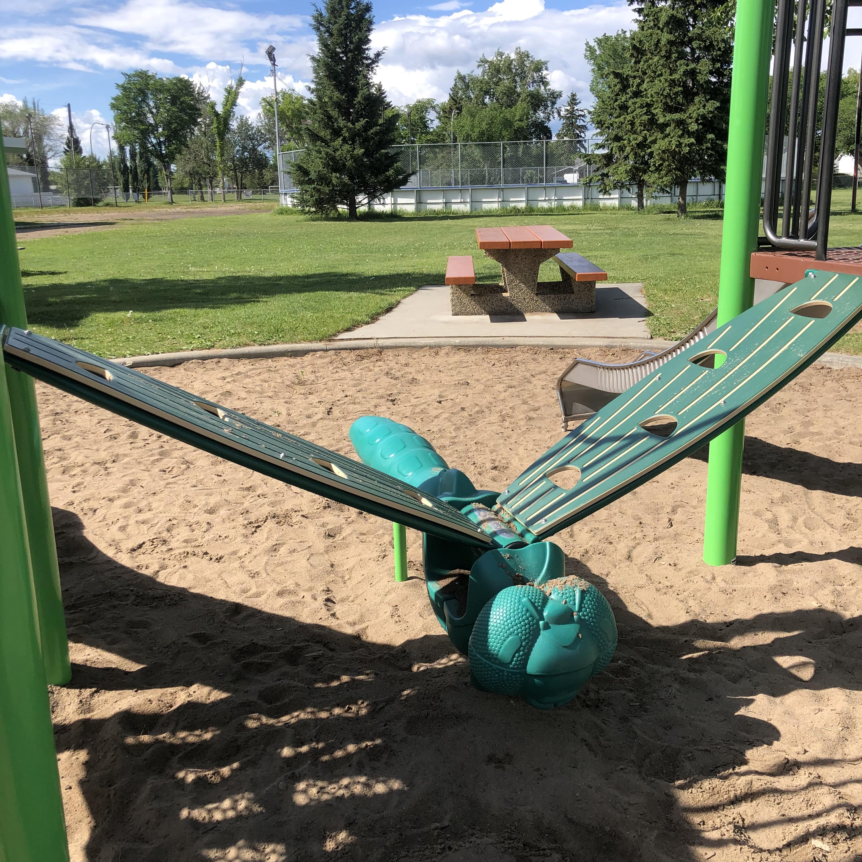 Meadowlark Park (Edmonton, AB) playground in Edmonton, AB - playground swings and slides