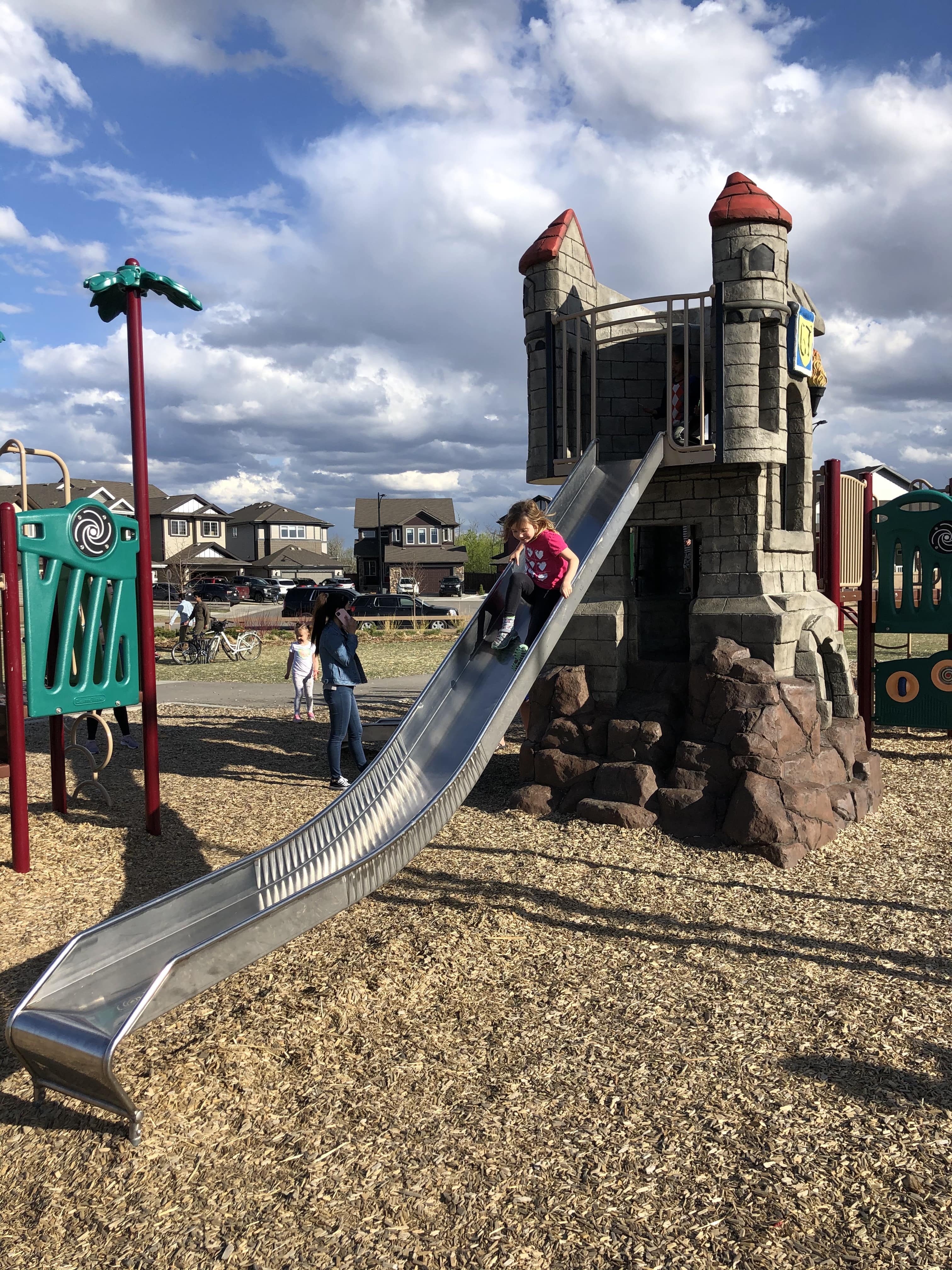 Rapperswill Playground playground in Edmonton, AB - play area surfacing and safety features