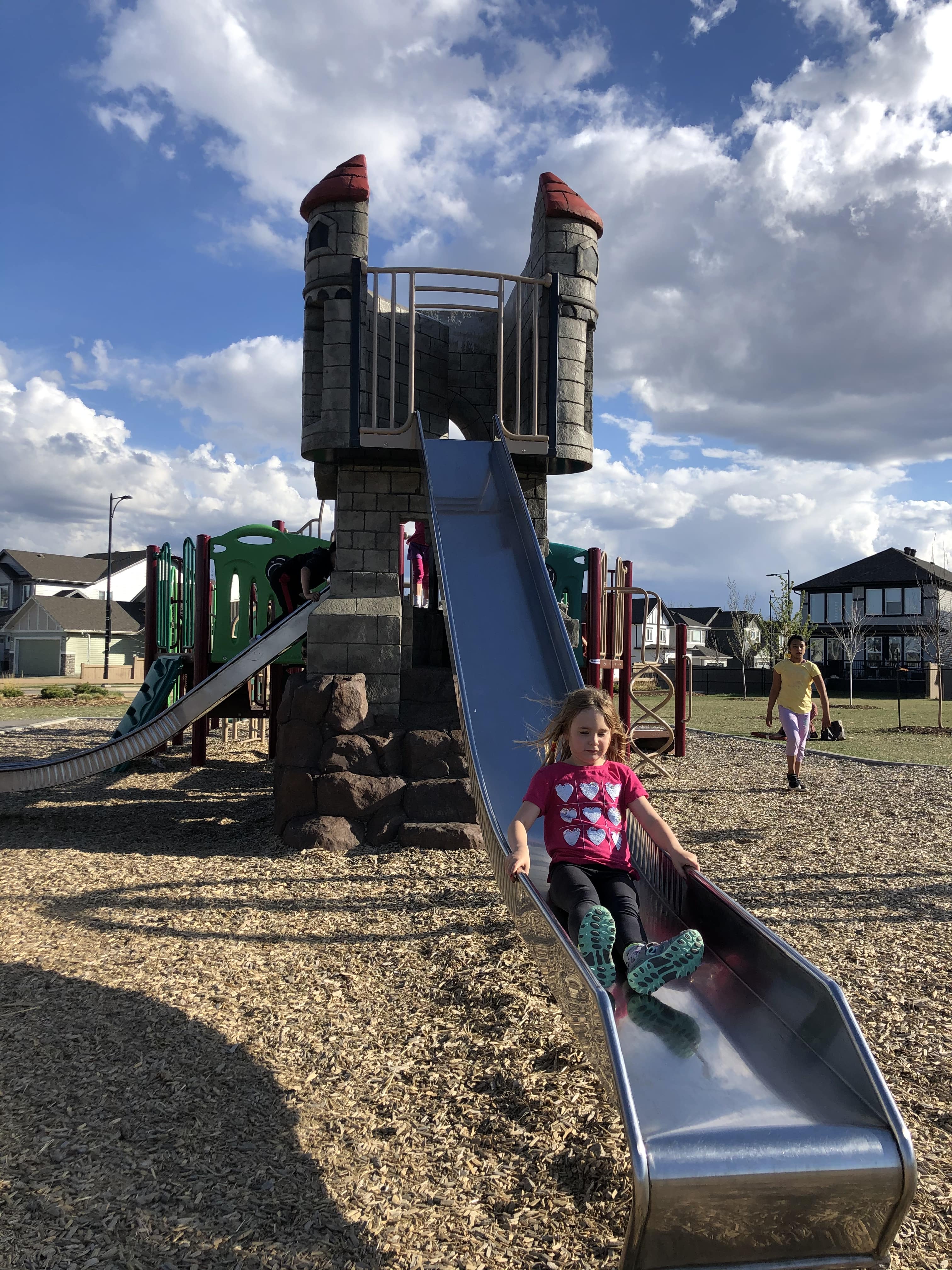 Rapperswill Playground playground in Edmonton, AB - play area with shade structures