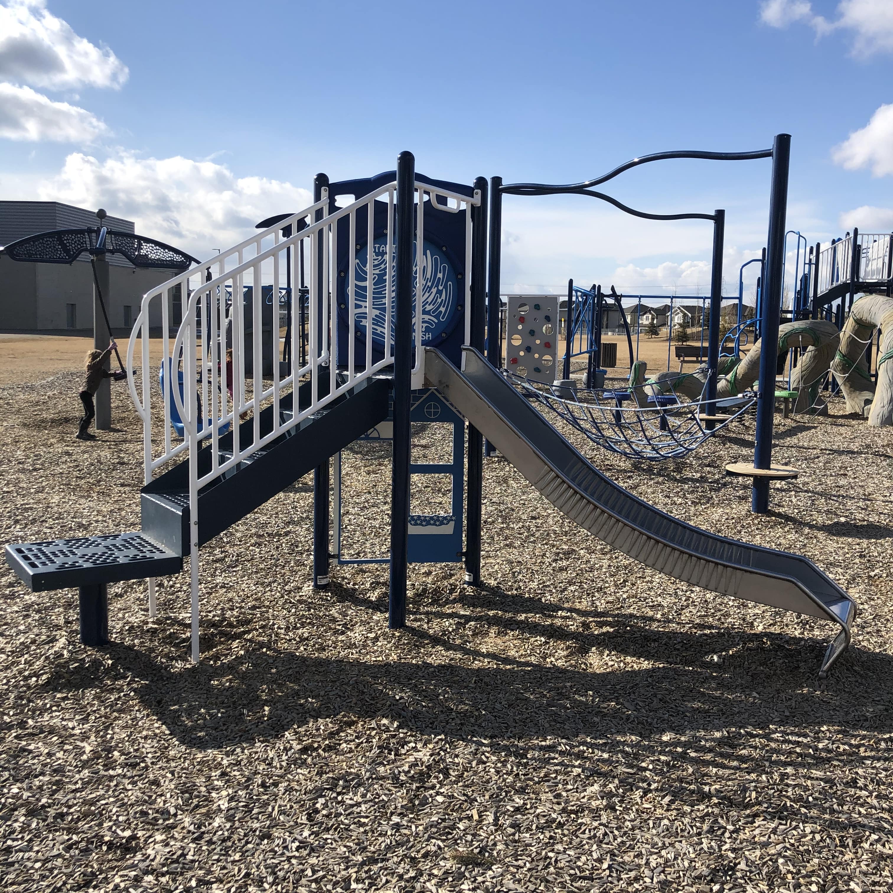 Svend Hanson School (Edmonton, AB) playground in Edmonton, AB - overview of play area and equipment