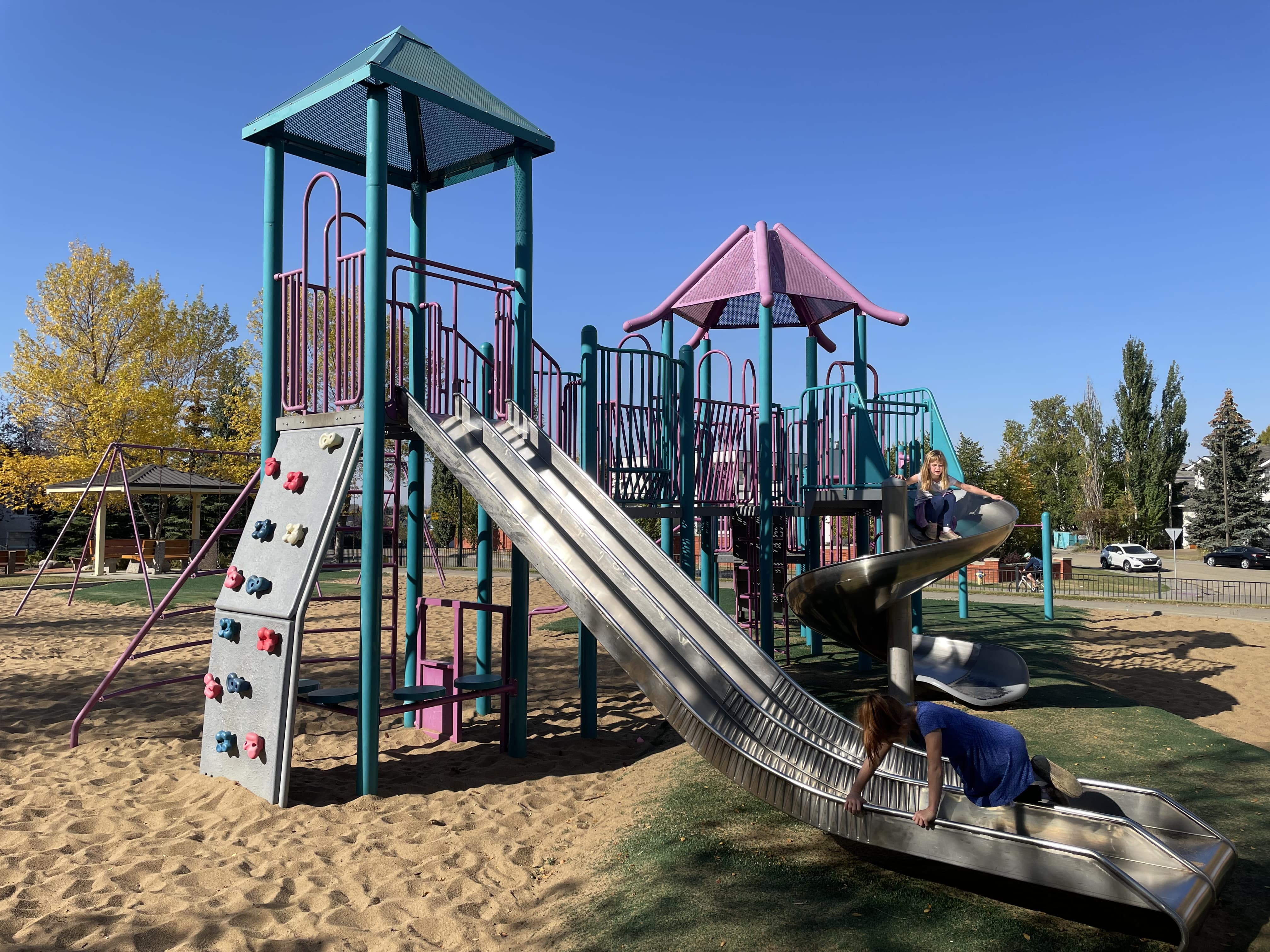 Falconer Heights Playground (Edmonton, AB) playground in Edmonton, AB - children playing on equipment