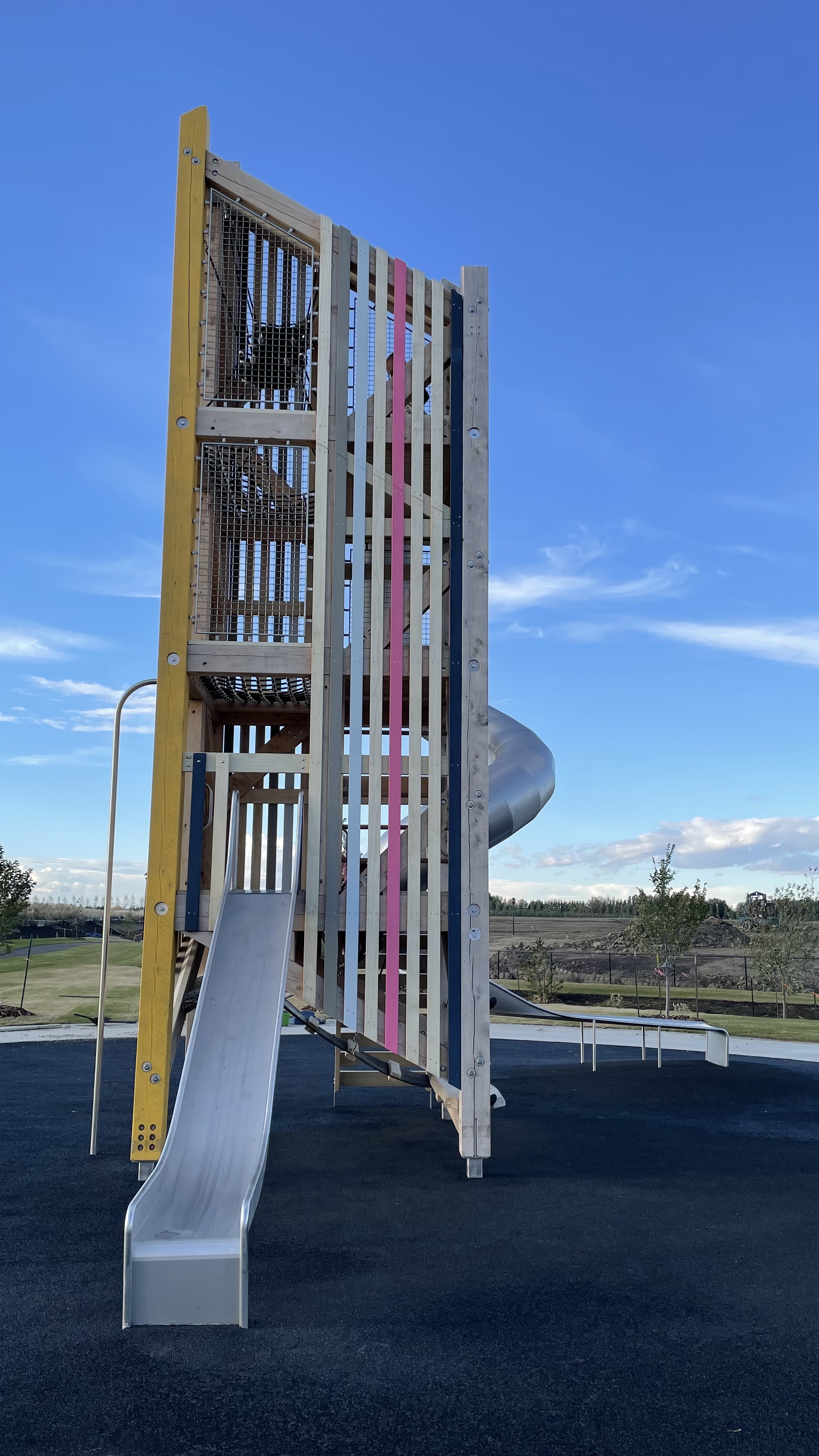 Parc Réunis playground in Beaumont, AB - accessible play equipment