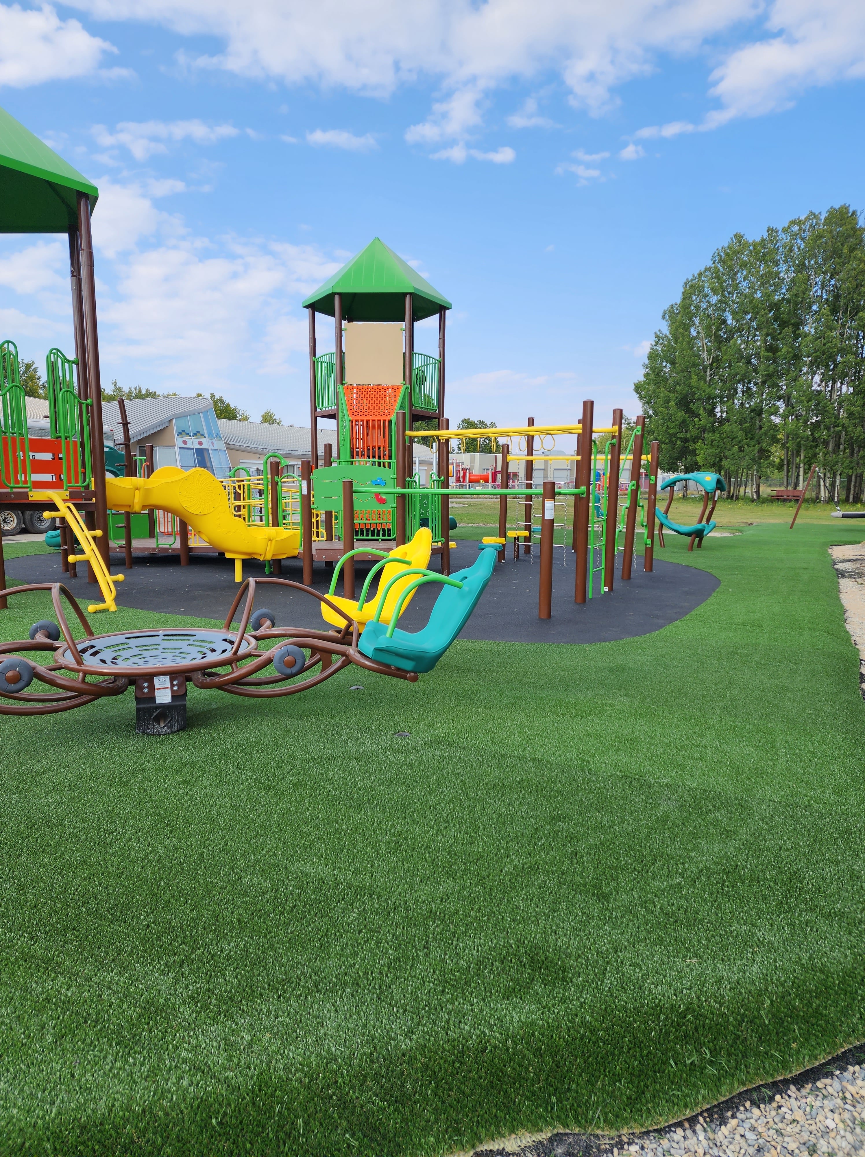 Chiila School (Tsuut-ina Reserve, AB) playground in Tsuut-ina Reserve, AB - outdoor recreational equipment