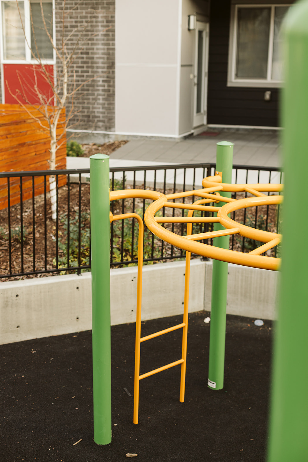 Redstone (Calgary, AB) playground in Calgary, AB - children playing on equipment