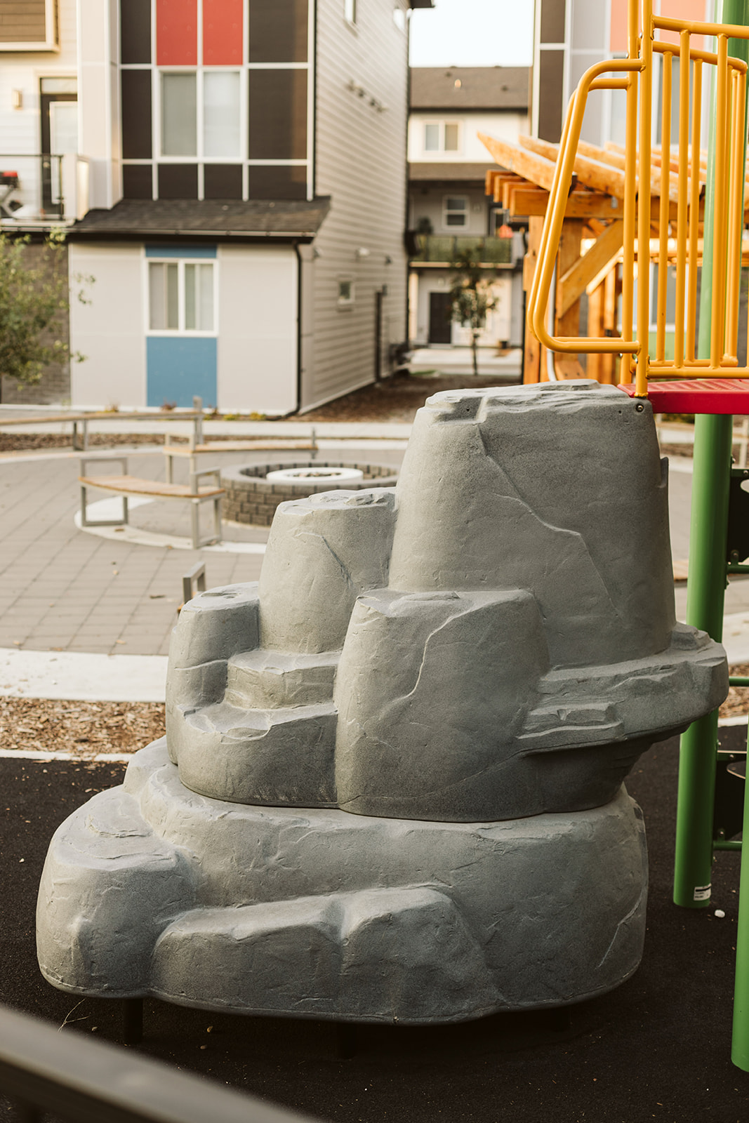 Redstone (Calgary, AB) playground in Calgary, AB - children playing on equipment