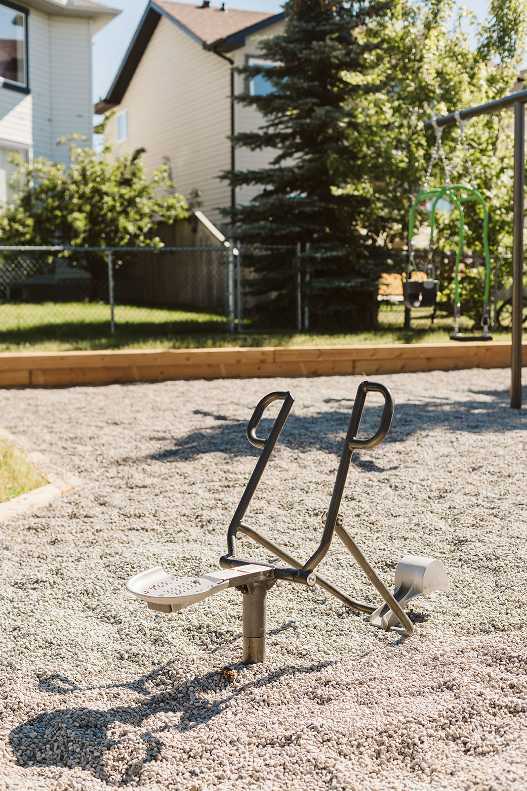Chapalina Crescent (Calgary, AB) playground in Calgary, AB - play area surfacing and safety features