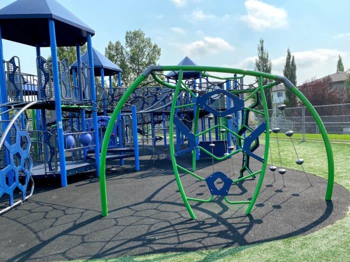 Hidden Valley Playground (Calgary, AB) playground in Calgary, AB - play area surfacing and safety features