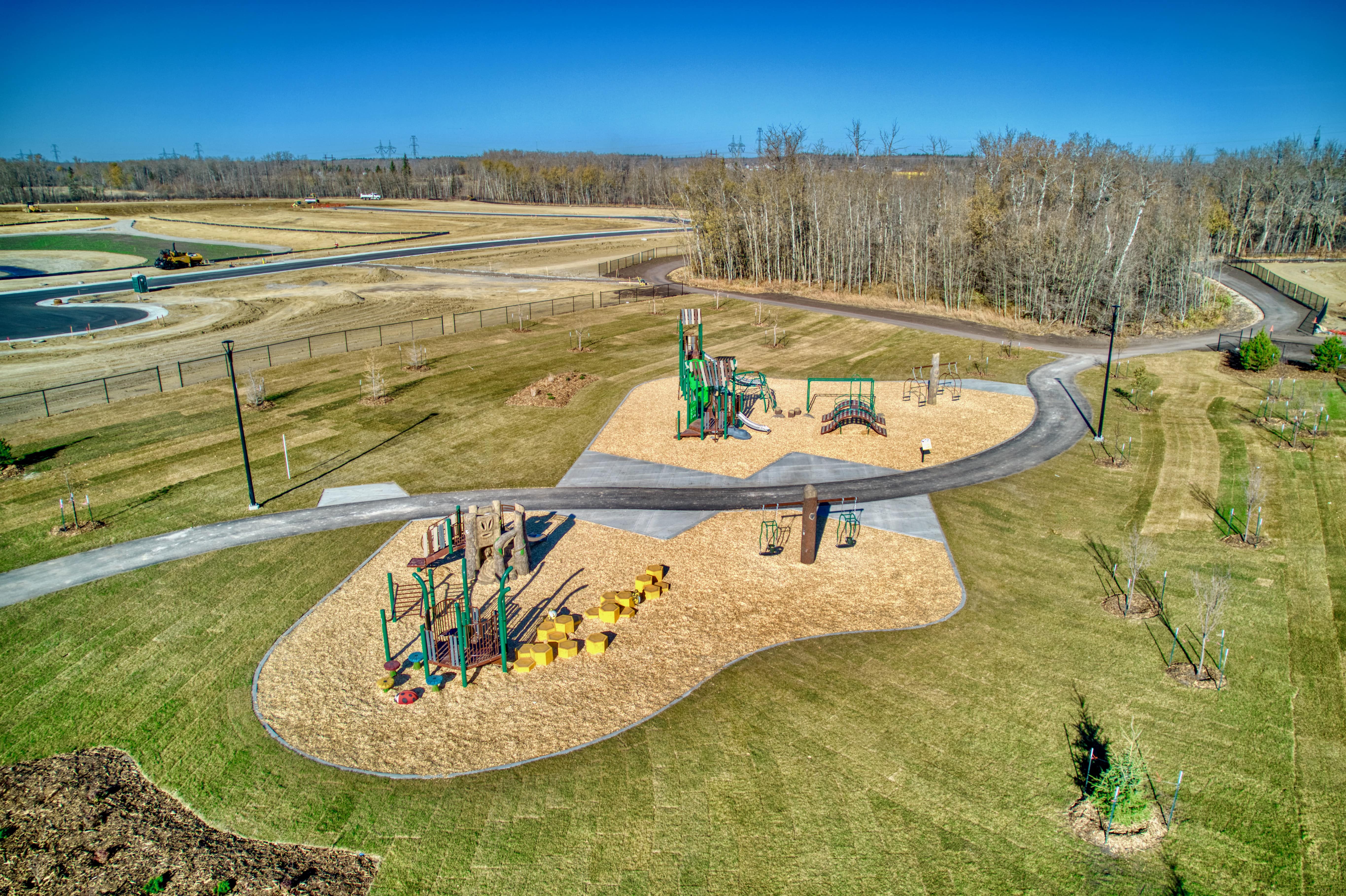 Uplands Playground (Edmonton, AB) playground in Edmonton, AB - outdoor recreational equipment