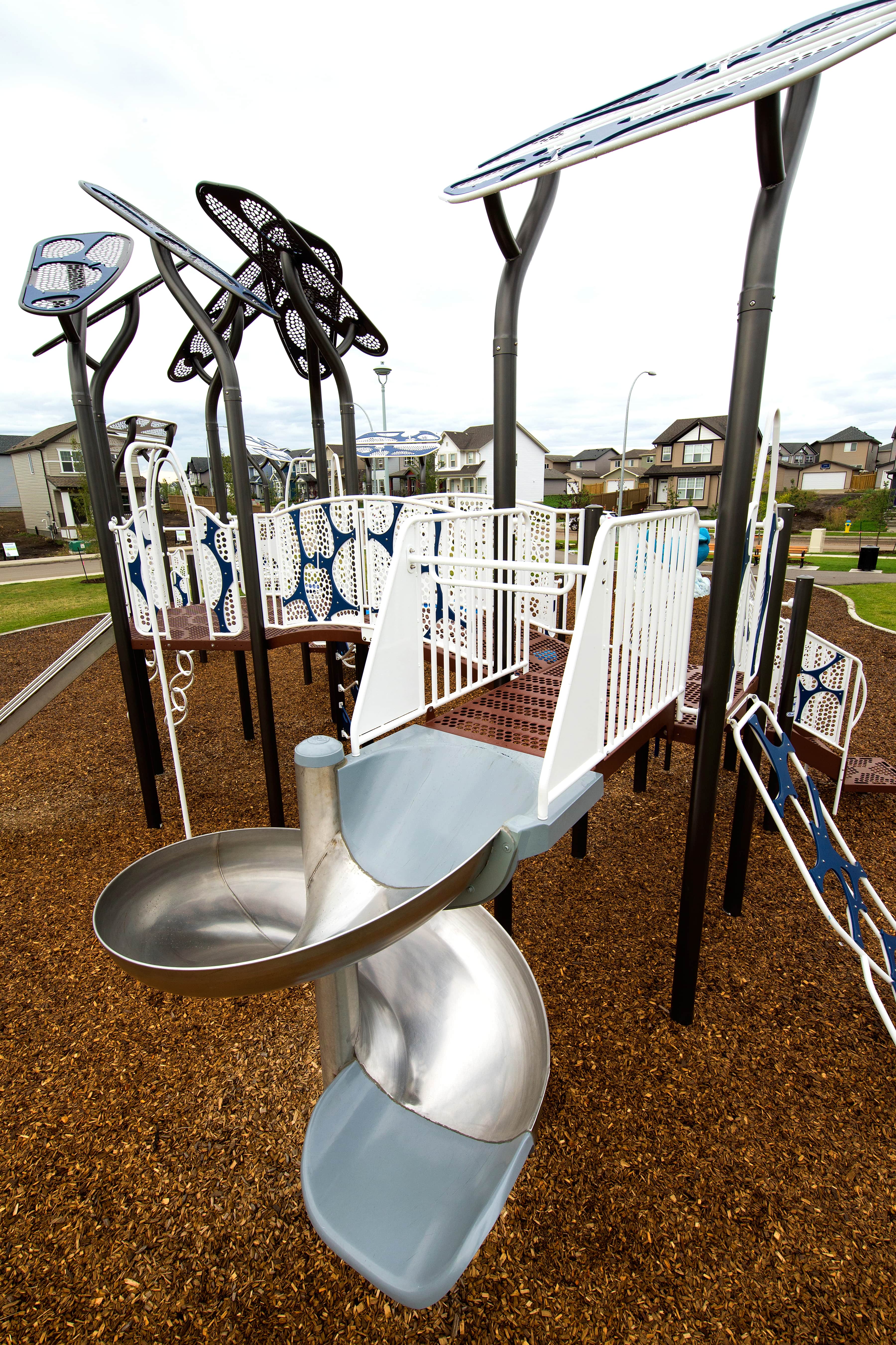 McConachie Subdivision playground in Edmonton, AB - playground swing sets and slides