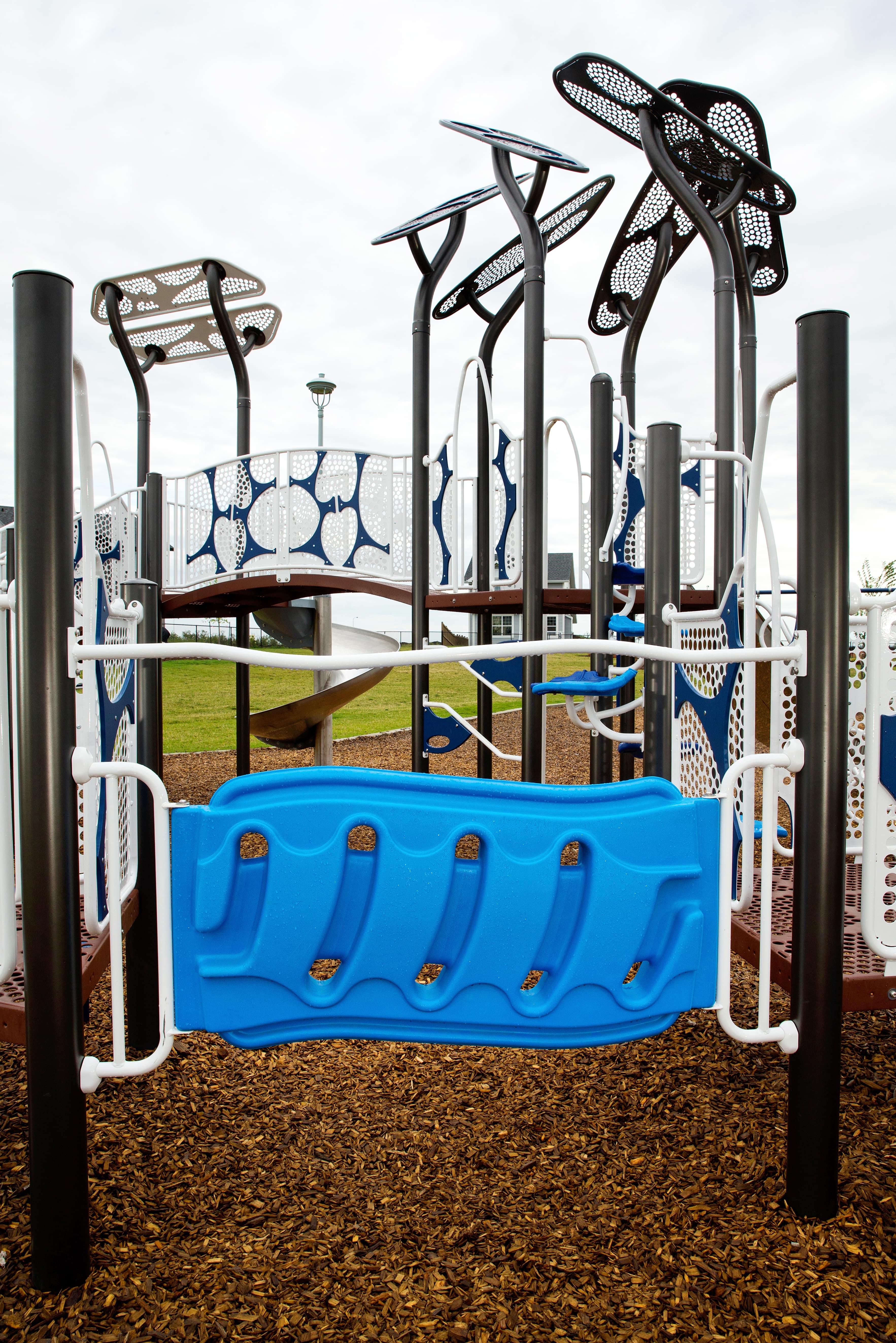 McConachie Subdivision (Edmonton, AB) playground in Edmonton, AB - play area surfacing and safety features