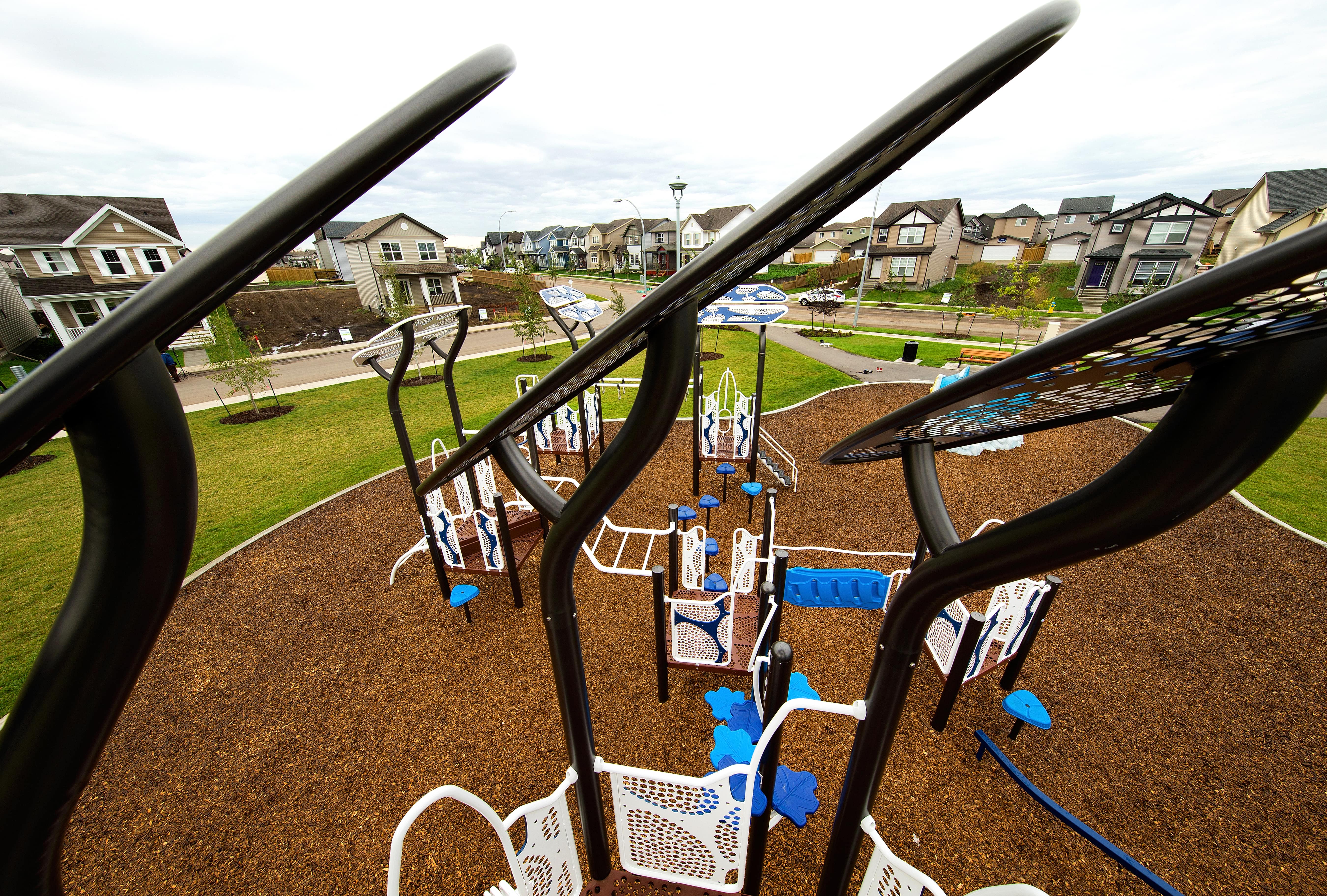 McConachie Subdivision playground in Edmonton, AB - play area surfacing and safety features