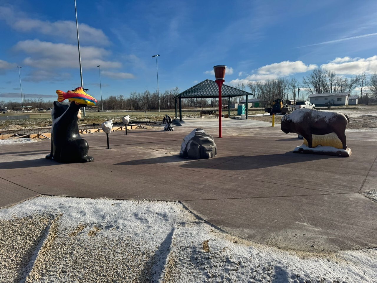 Dakota Plains Wahpeton First Nations playground in Wahpeton, Manitoba - overview of play area and equipment