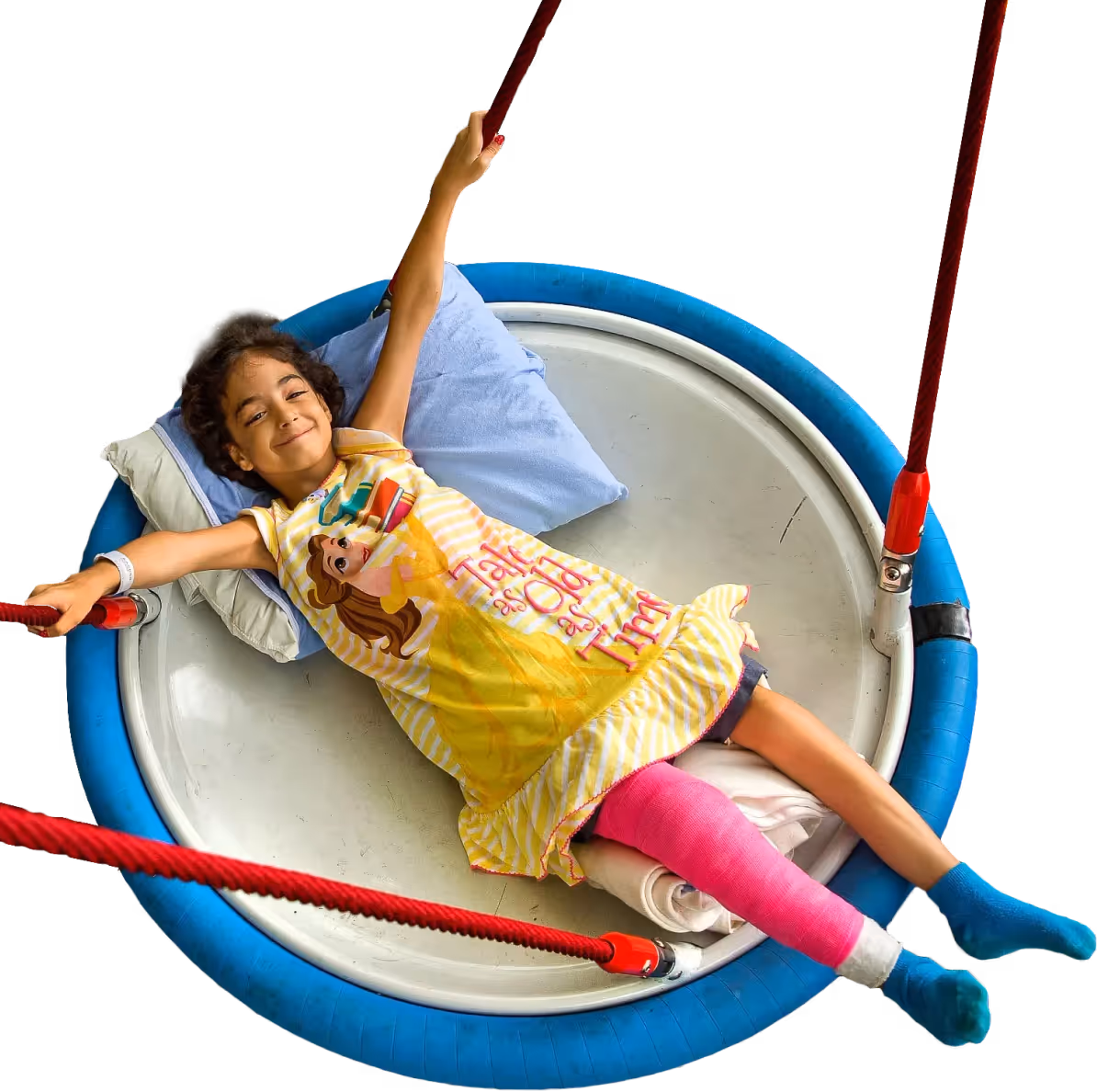 happy girl with broken leg on the rounded swing