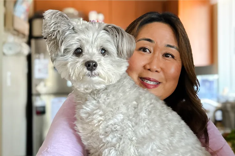 Coco Pop the dog with their mom.