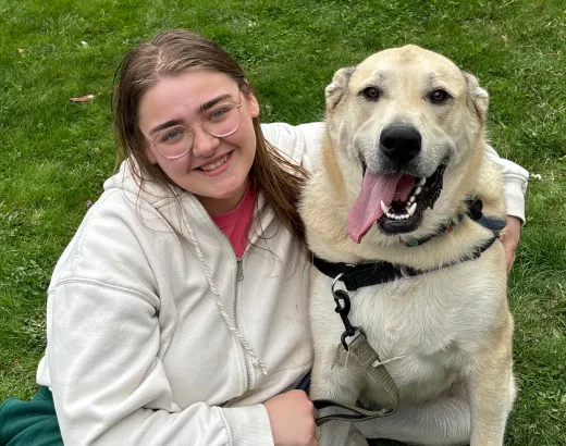 Mister Bear the dog outside with mom.