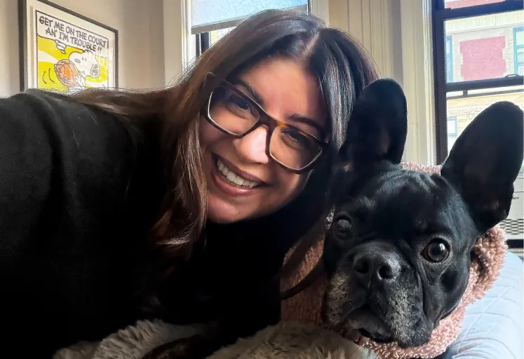 Pablo the dog posing with mom.