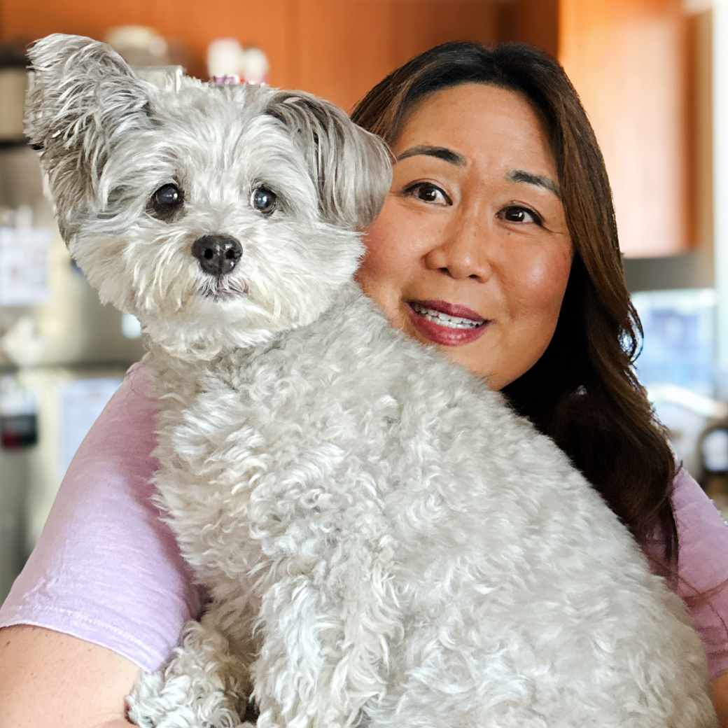 Coco Pop the dog with their mom.