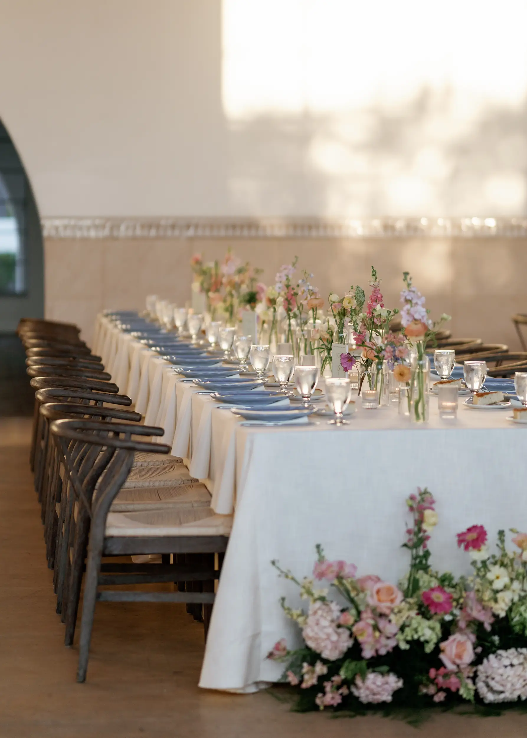 Colorful wedding reception tabletop decor.