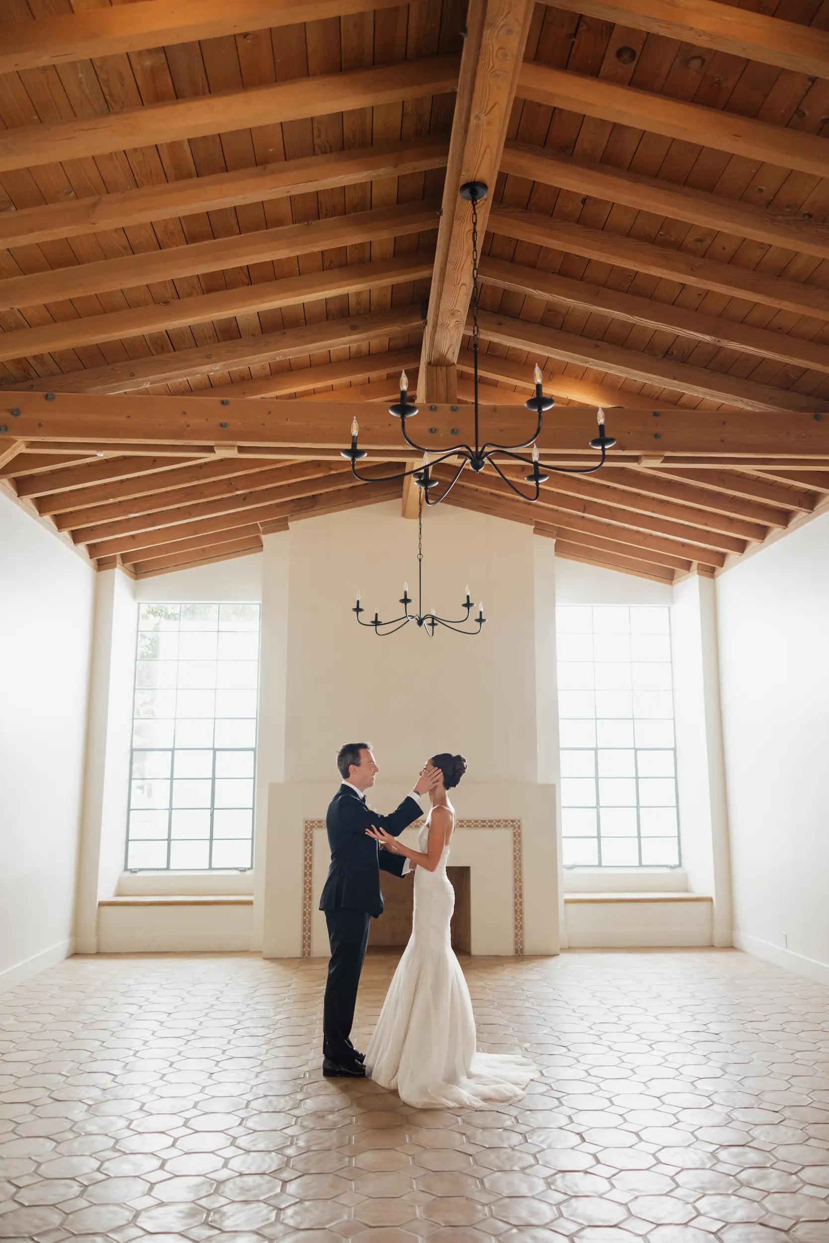Bride and groom share their first look in the Spanish Revival-style wedding venue, Grand Gimeno.