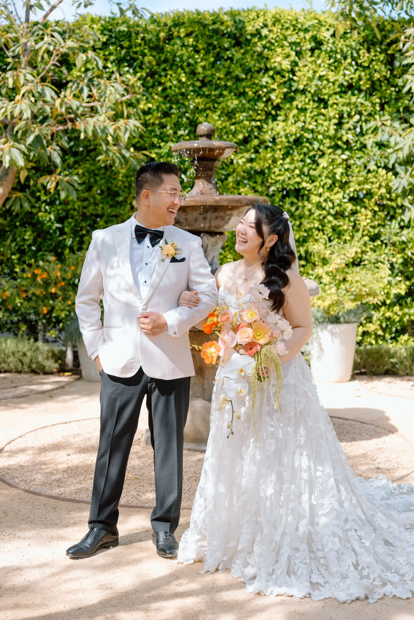 Bride and groom smile for their first look.