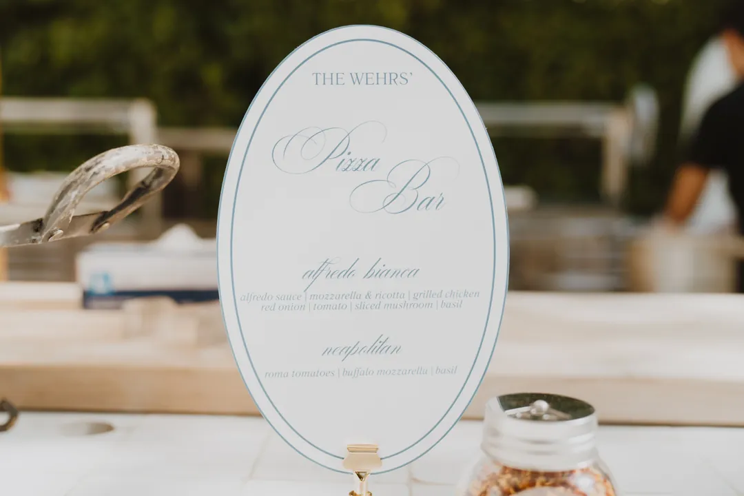 Oval printed pizza bar menu on the serving counter