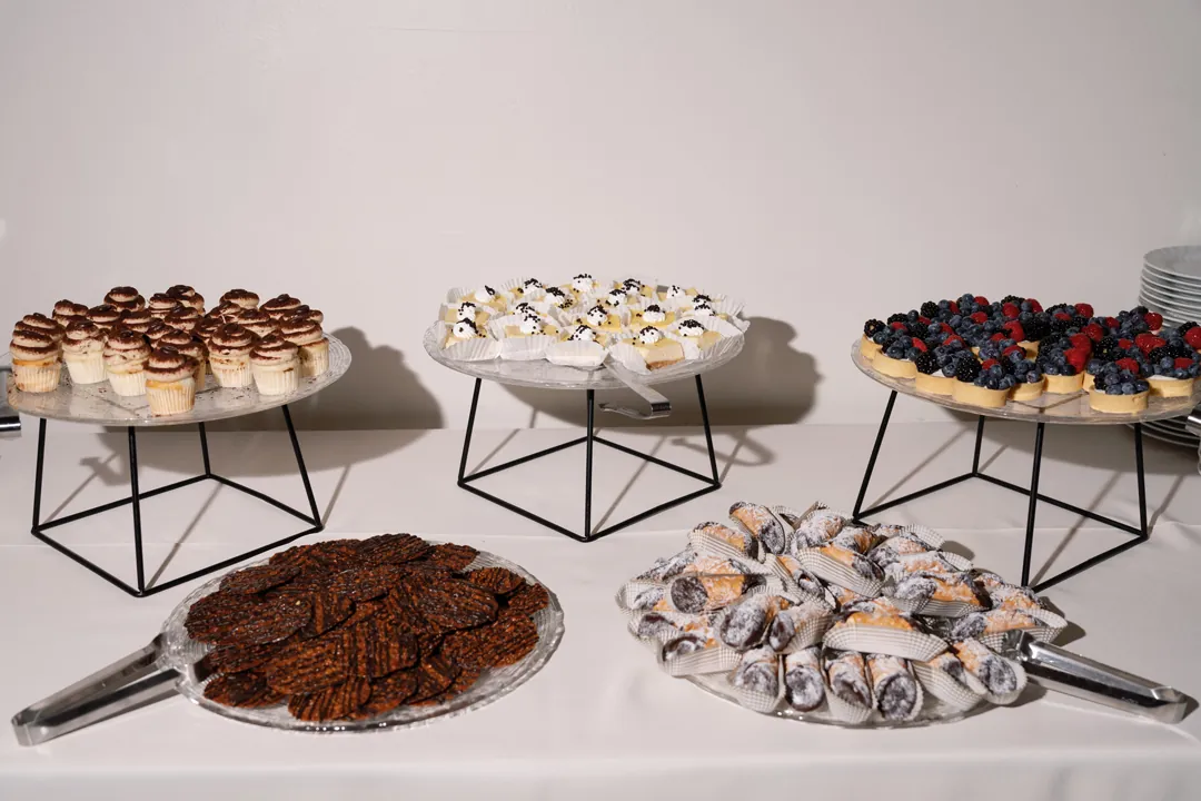Assorted desserts on raised serving trays