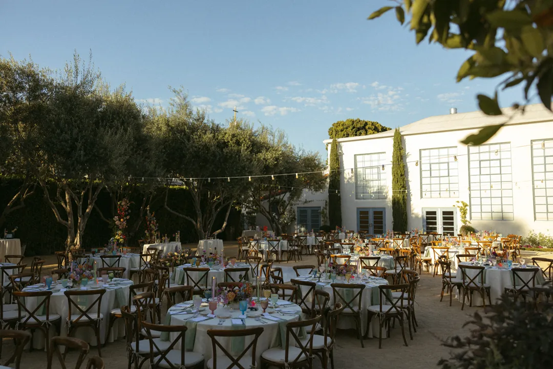 Reception tables arranged across the courtyard