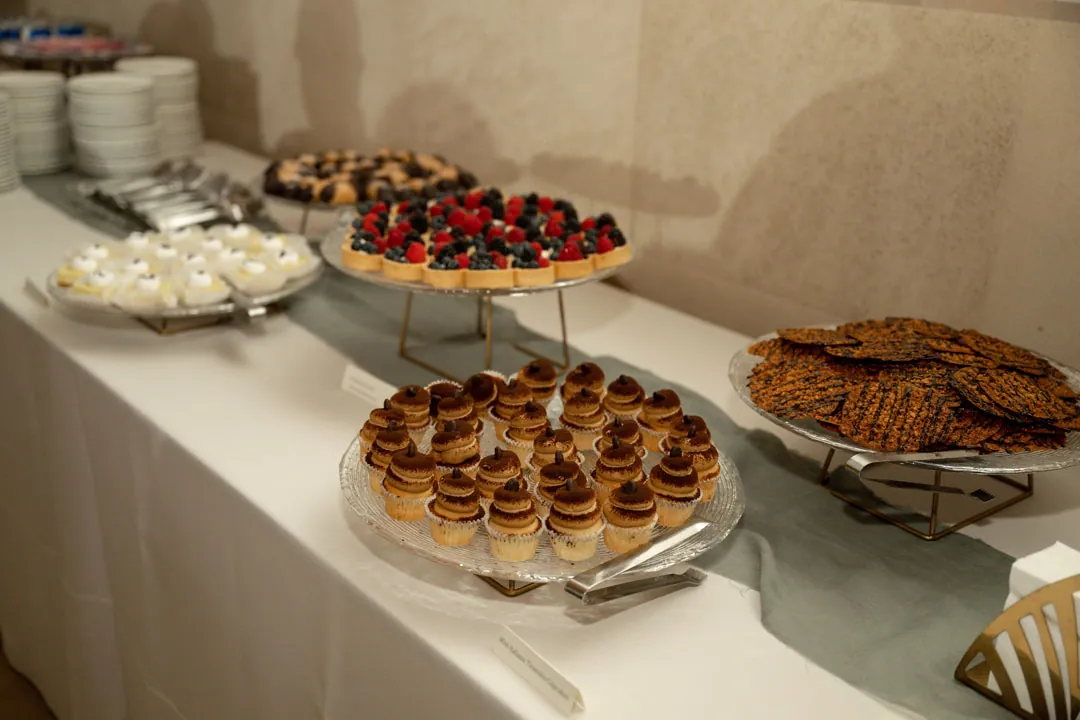 Assorted small desserts on a display table