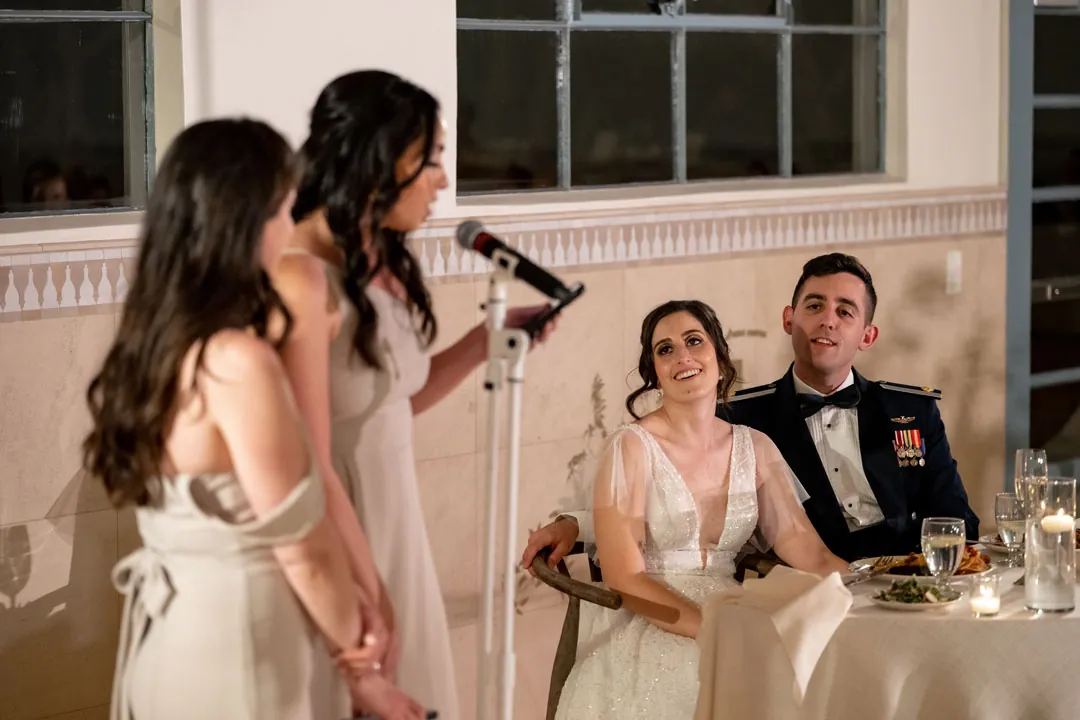 Guests speaking beside the seated couple