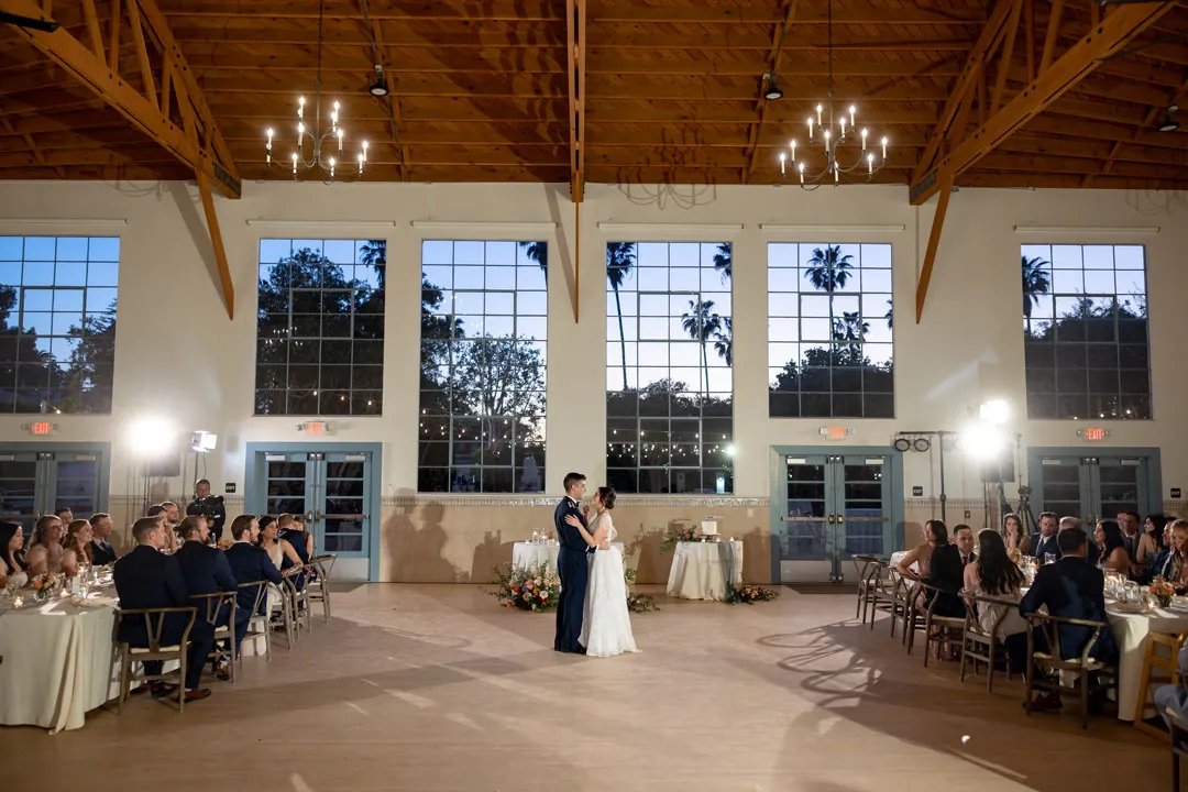Guests watching the bride and groom’s first dance