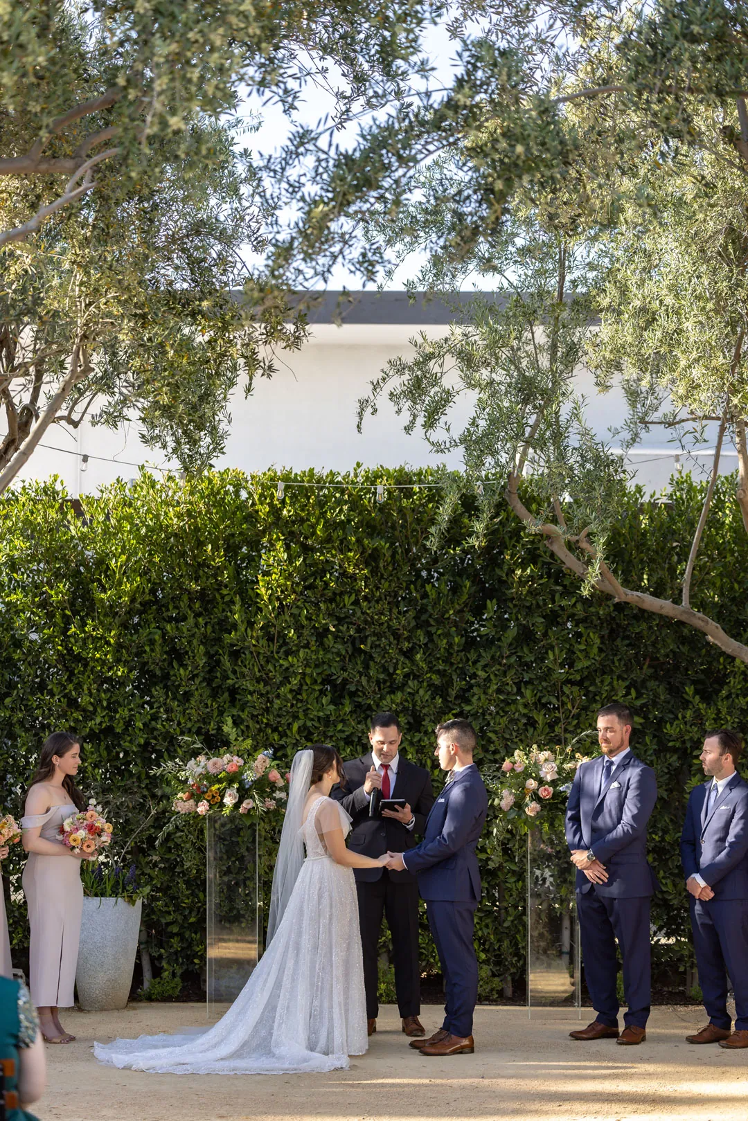 Bride and groom facing each other during the ceremony