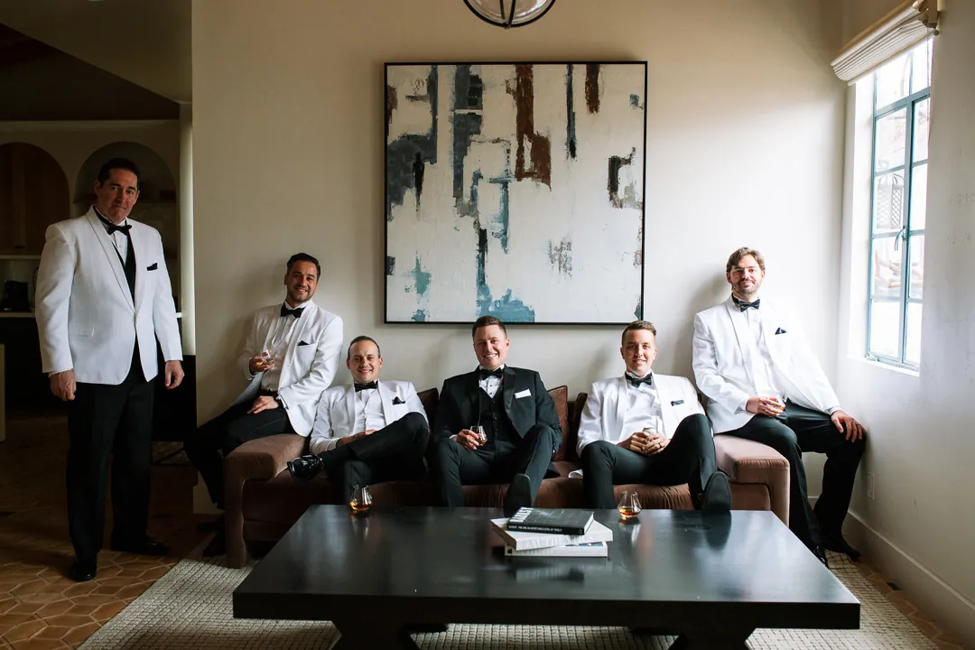 Groom and groomsmen getting ready in the lounge