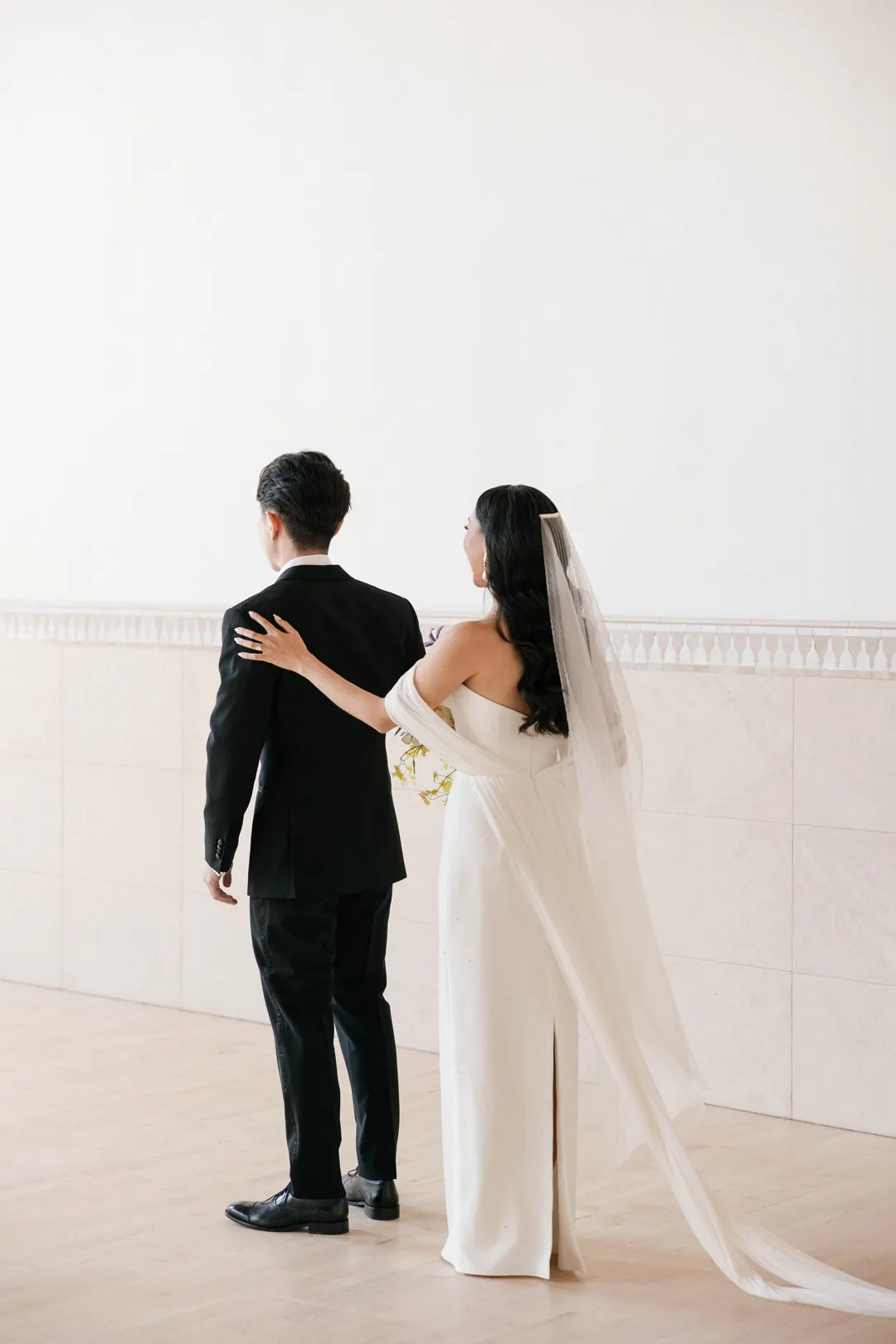 Bride approaching the groom from behind