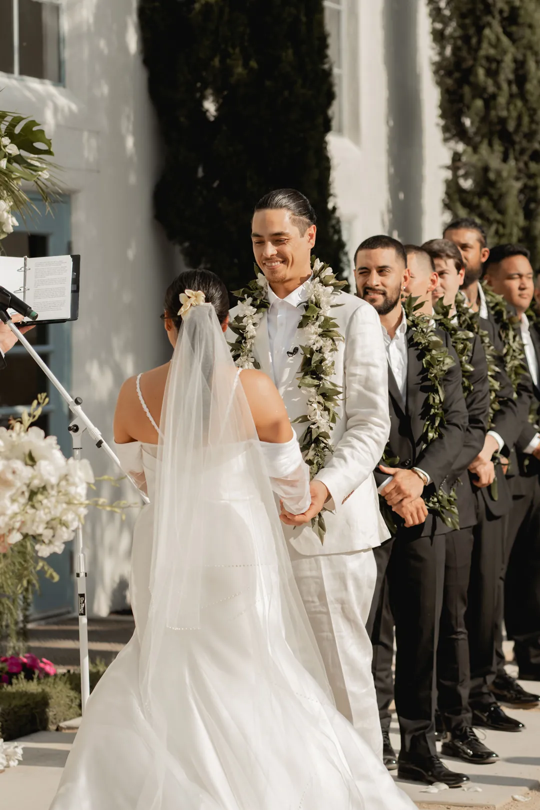 Bride and groom facing each other during the ceremony