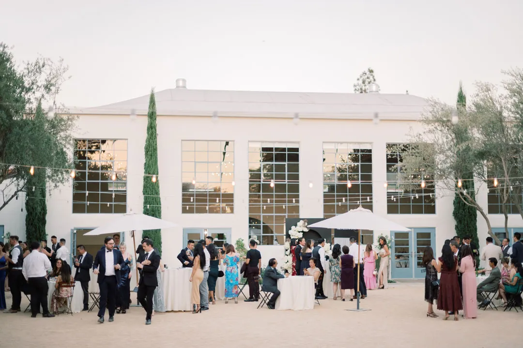 Guests gathered outside the reception hall after the ceremony