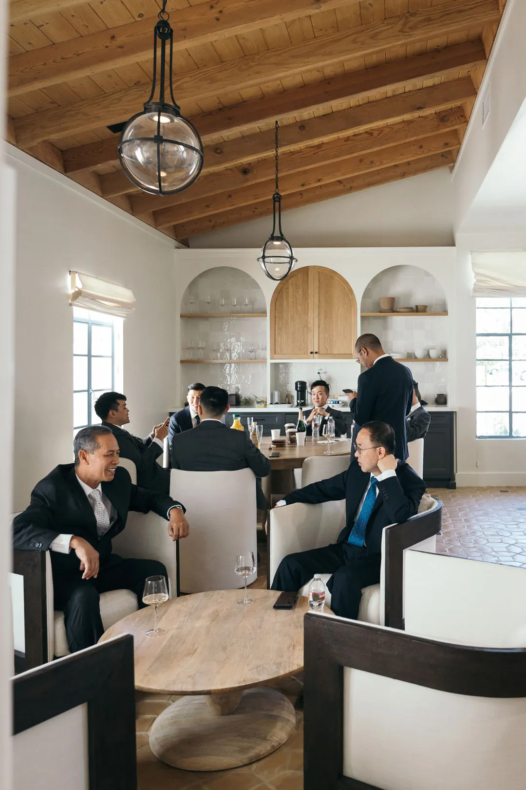 Groom and groomsmen gathered in the lounge