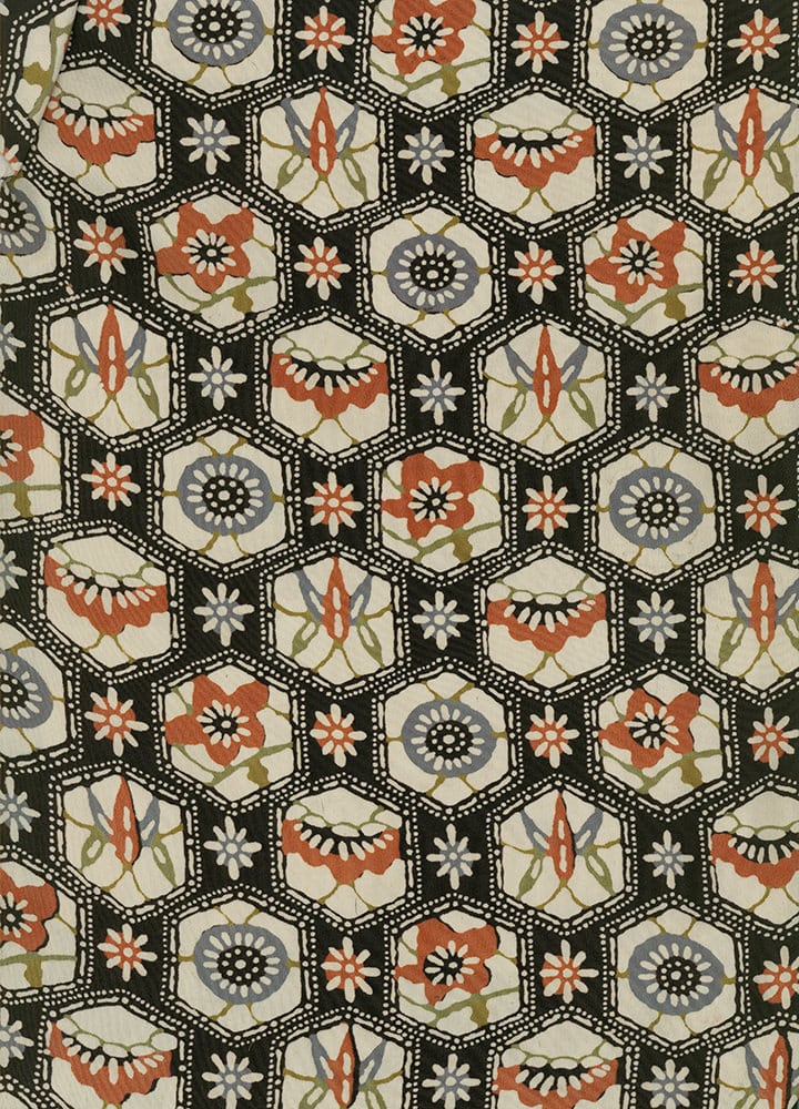 Vintage hexagonal pattern with floral motifs in rust, gray, and green