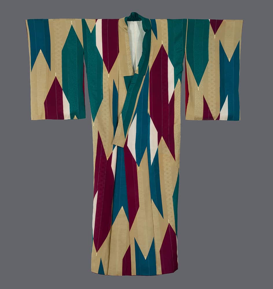Geometric patterned Japanese kimono in teal, burgundy, and gold colors