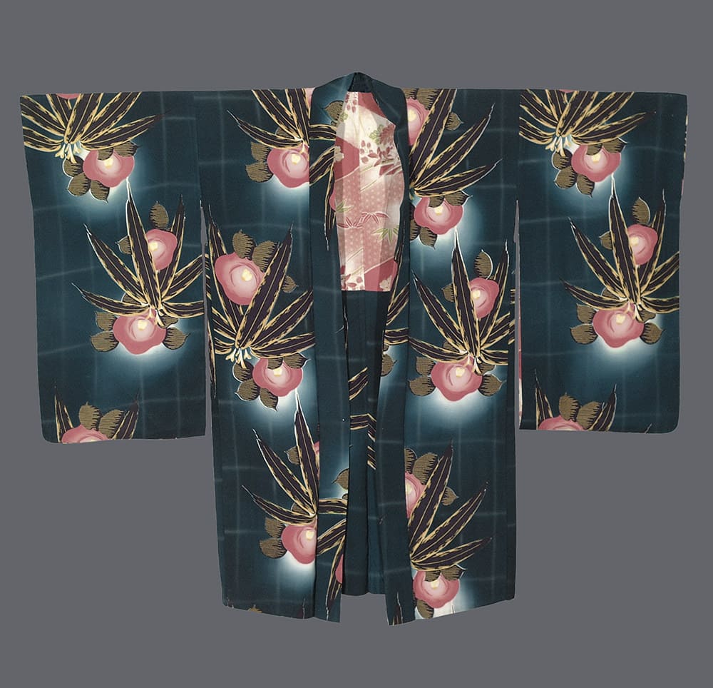 Japanese kimono with pink fruits and golden leaves on dark teal background