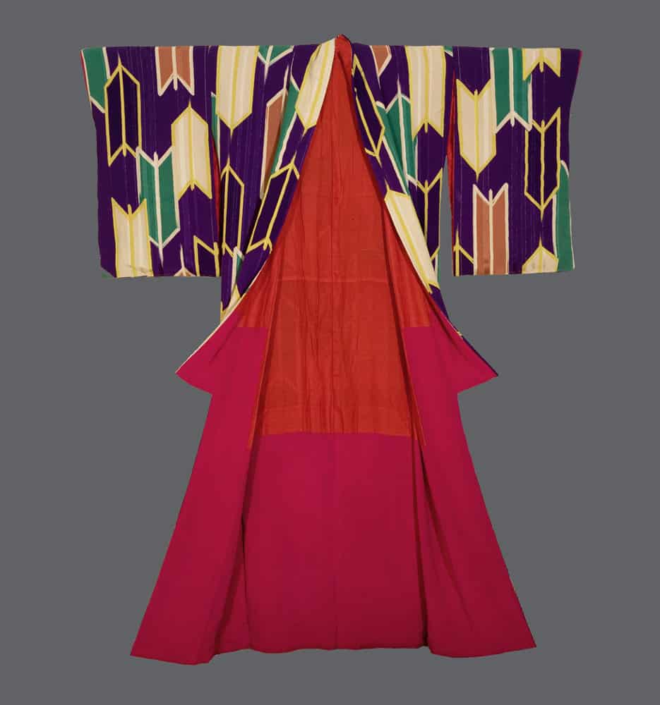 Colorful Japanese kimono with geometric patterns in purple, green, and red