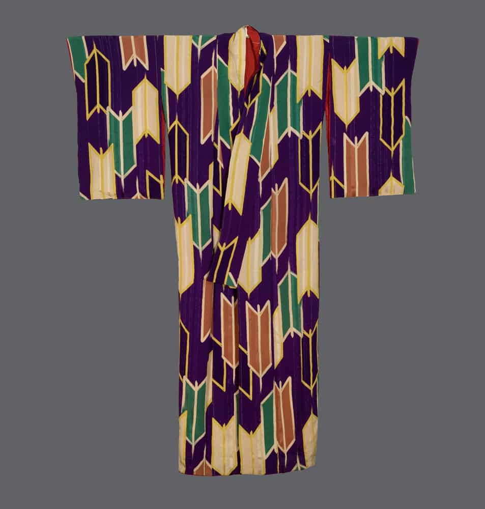Colorful Japanese kimono with geometric arrow-like pattern in purple, green, yellow